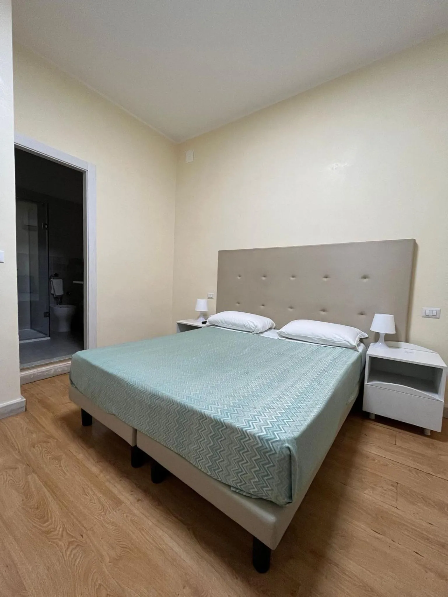 Bed in 38 Aira Hotels