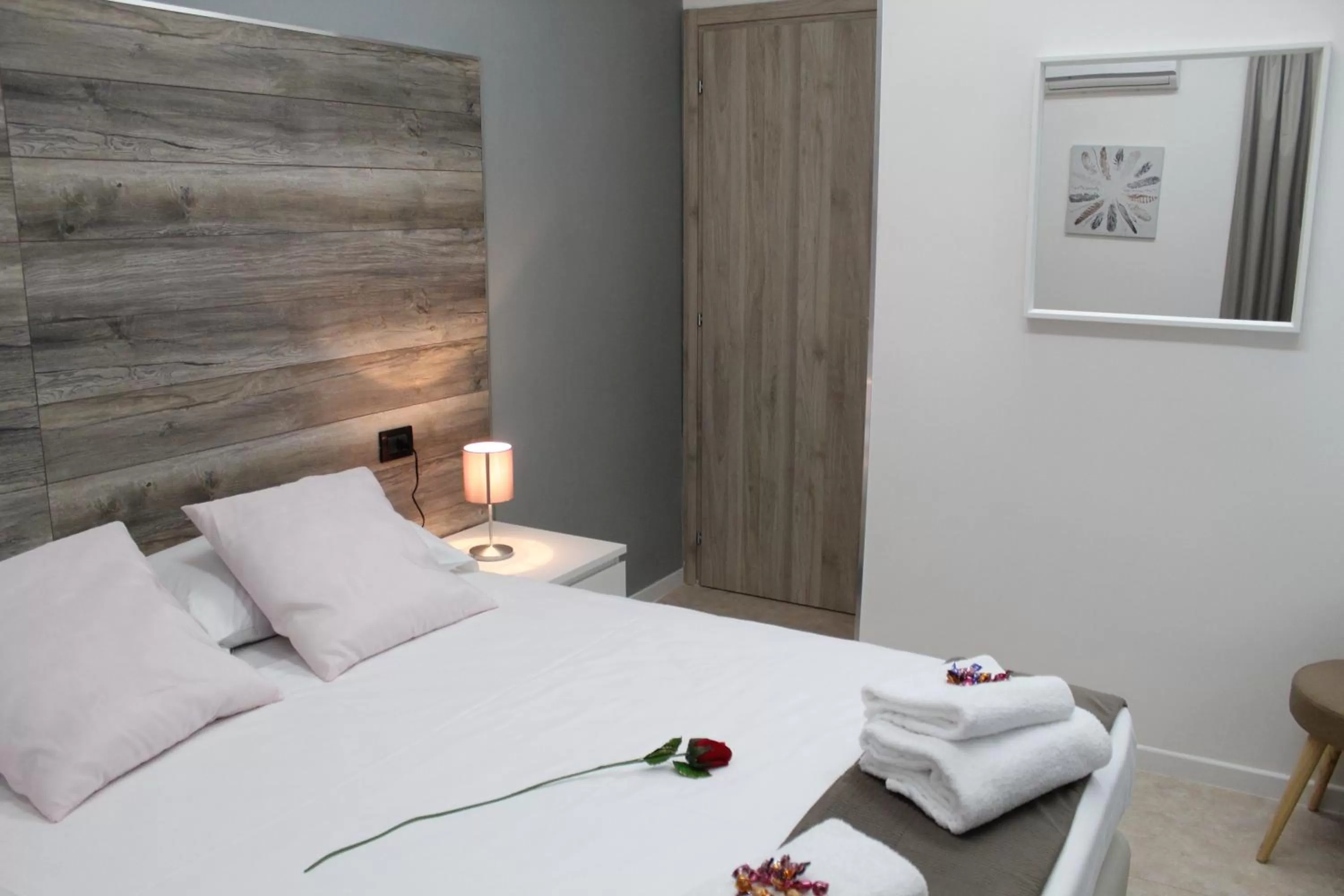 Bed in Royalty Rooms & Spa