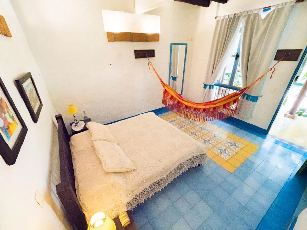 Bed in El Despertar Hotel