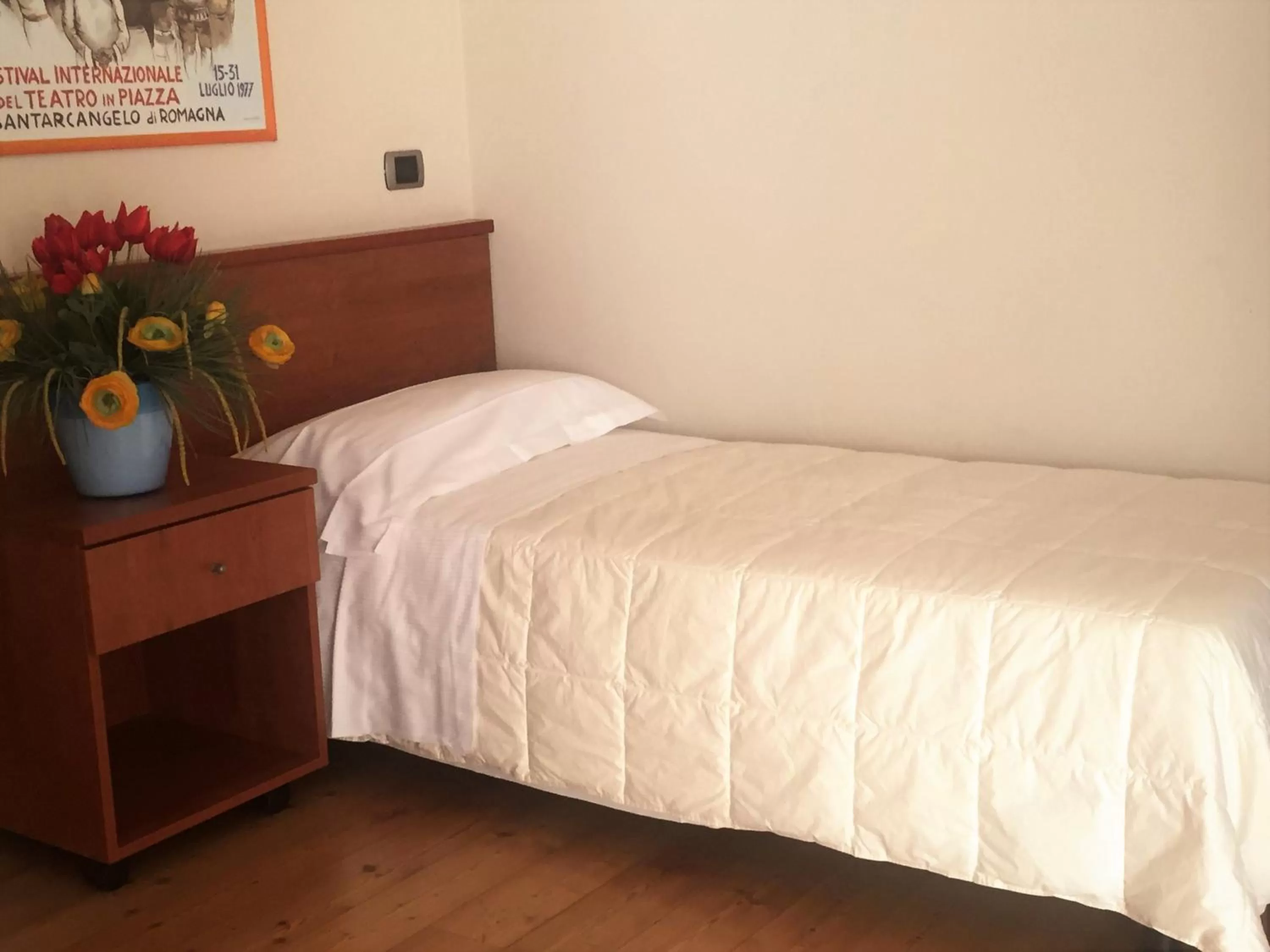 Bed in Hotel Rubicone