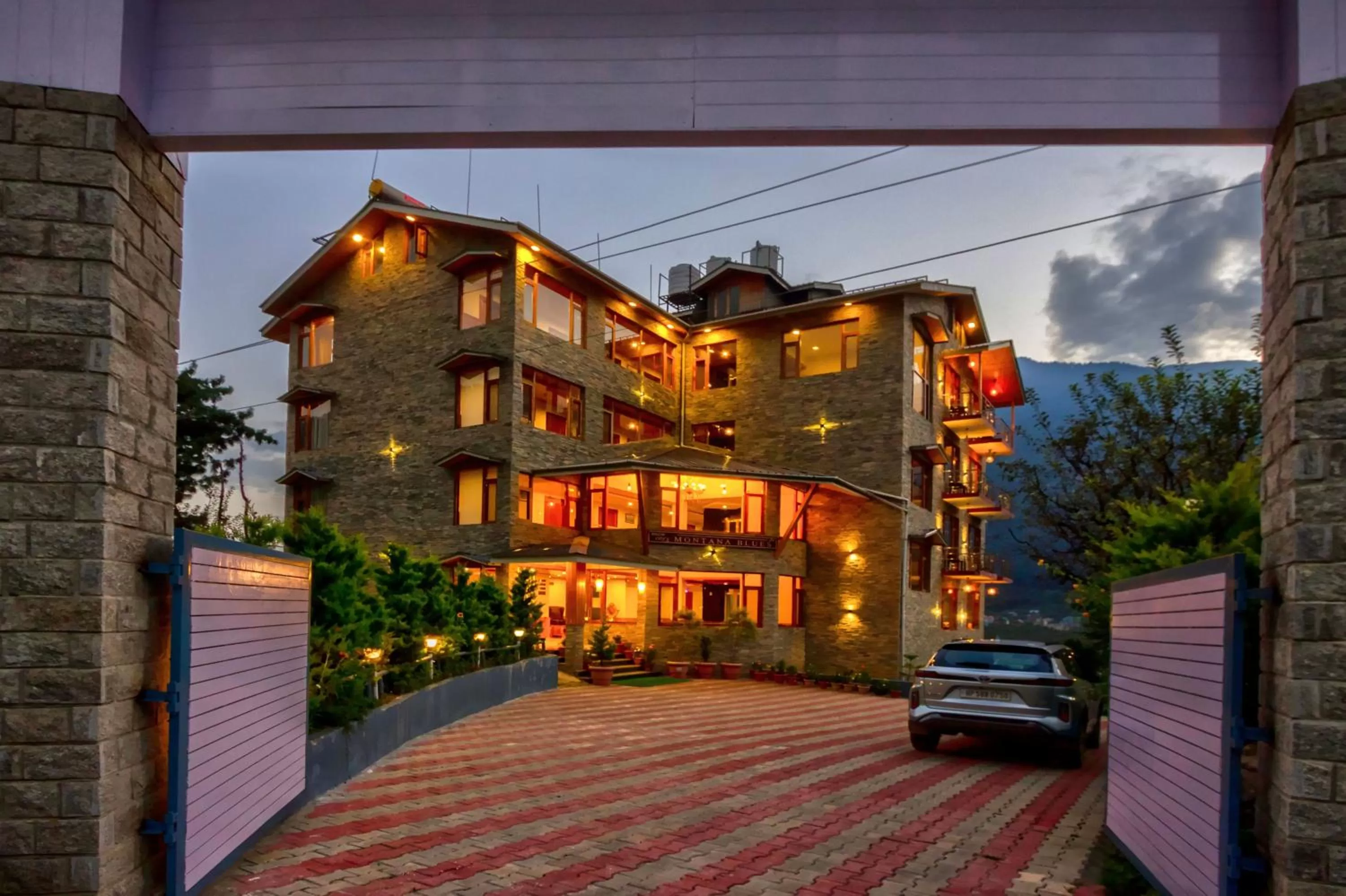 Property building in Snow City's Montana Blues Resort Manali - Heated & Air-Cooled Stay