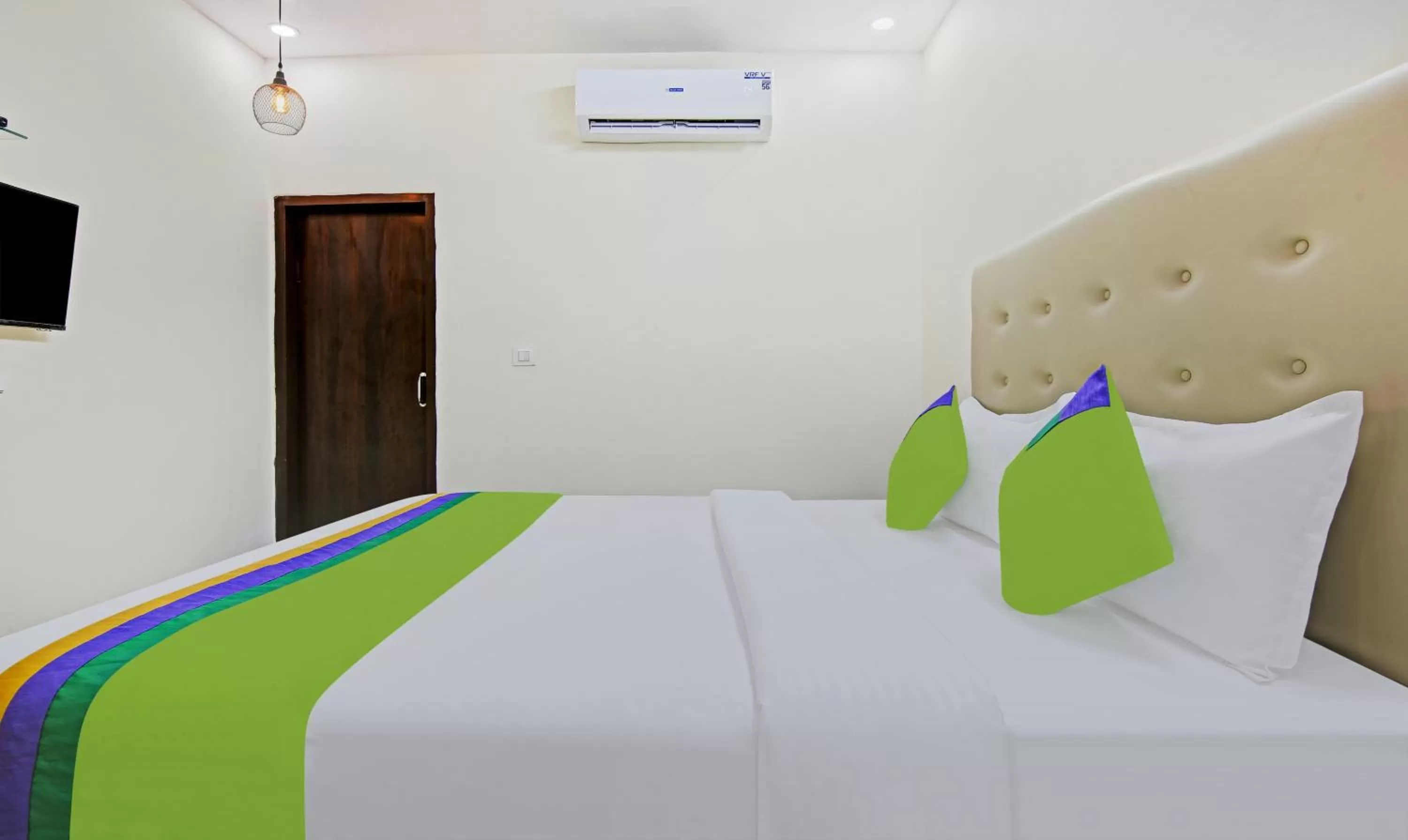 Bed in Treebo Trend Royal Empire