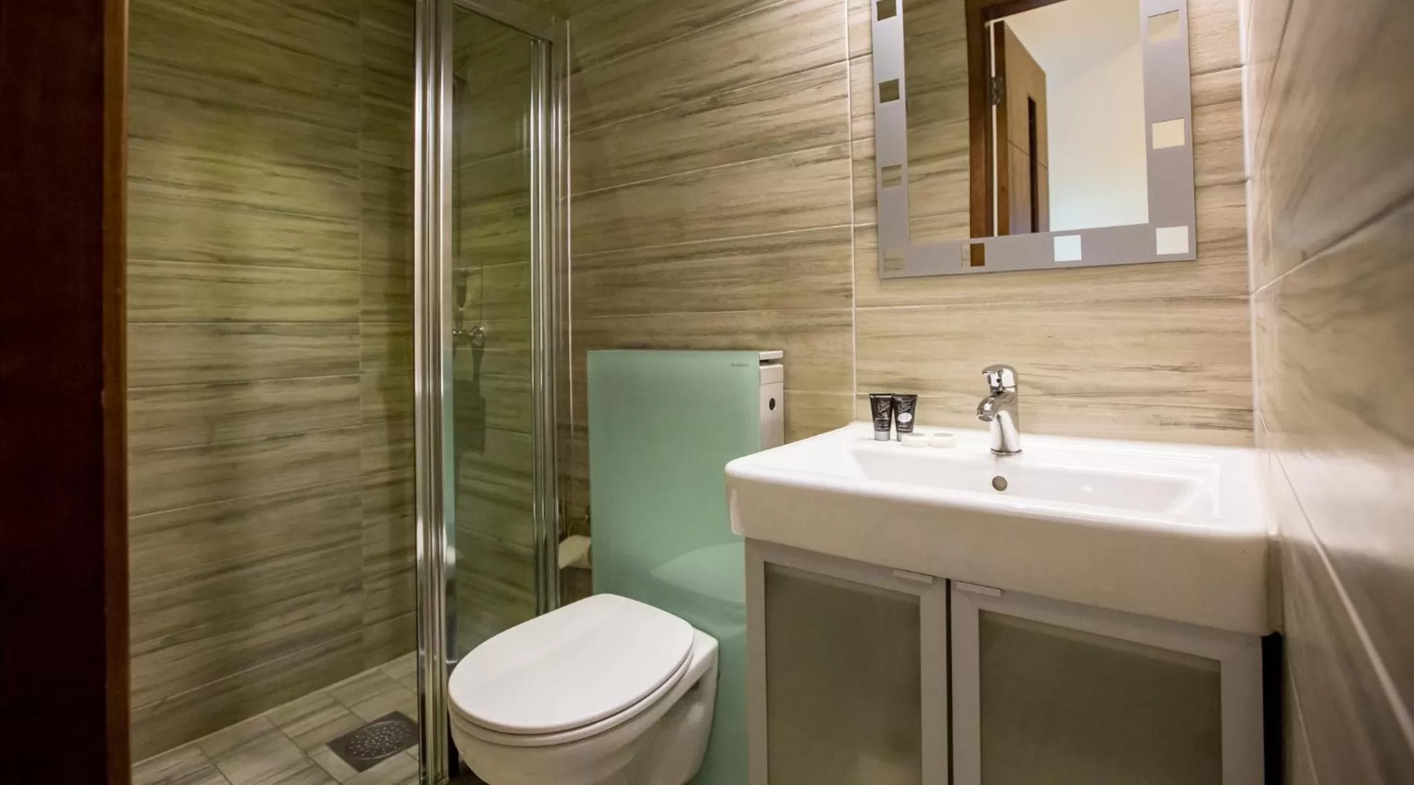 Toilet in Central City Apartments