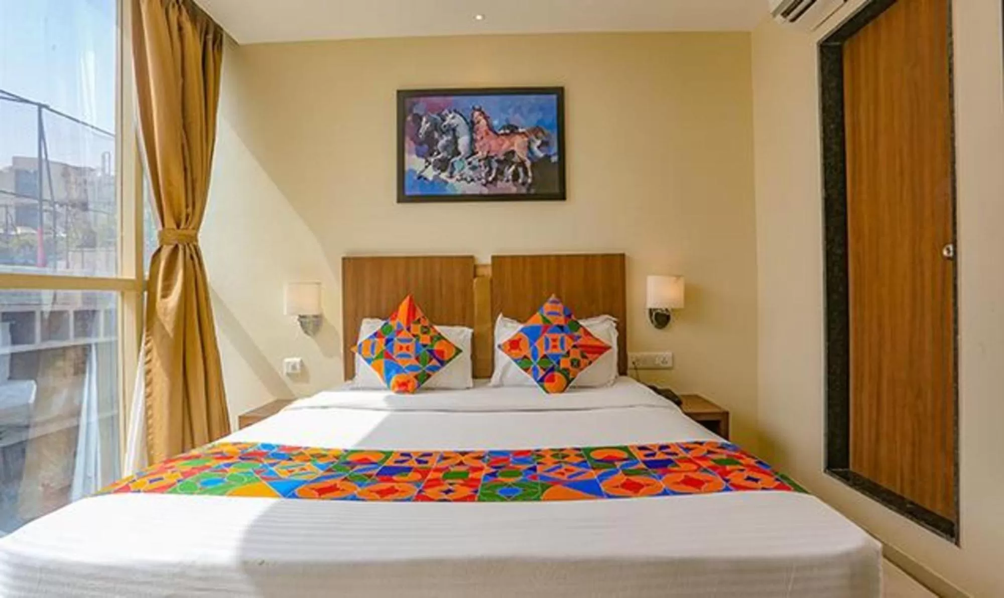 Bed in FabHotel Royal Mumbai International Airport