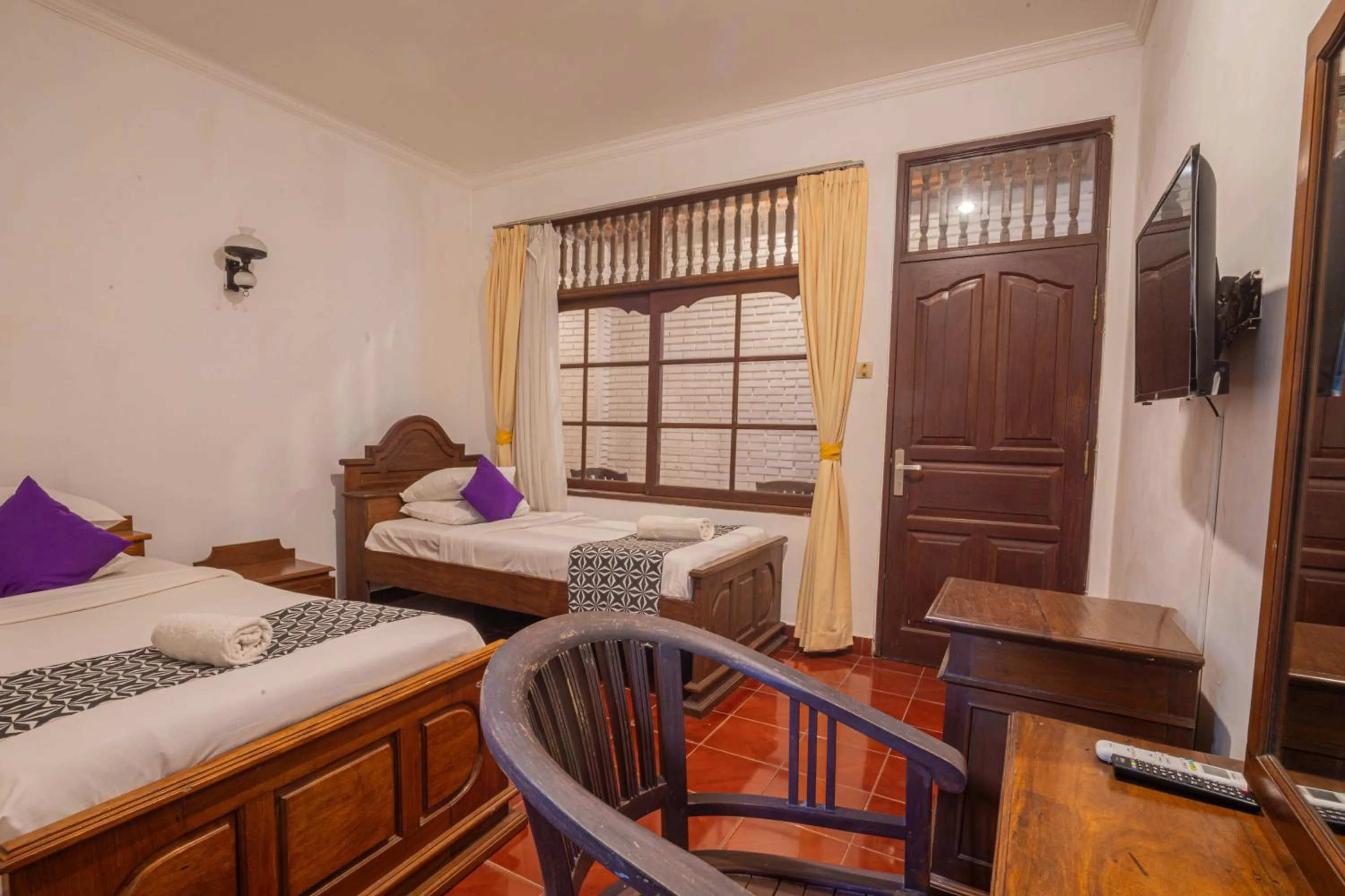 Bedroom in Puri Mango Guest House Sanur