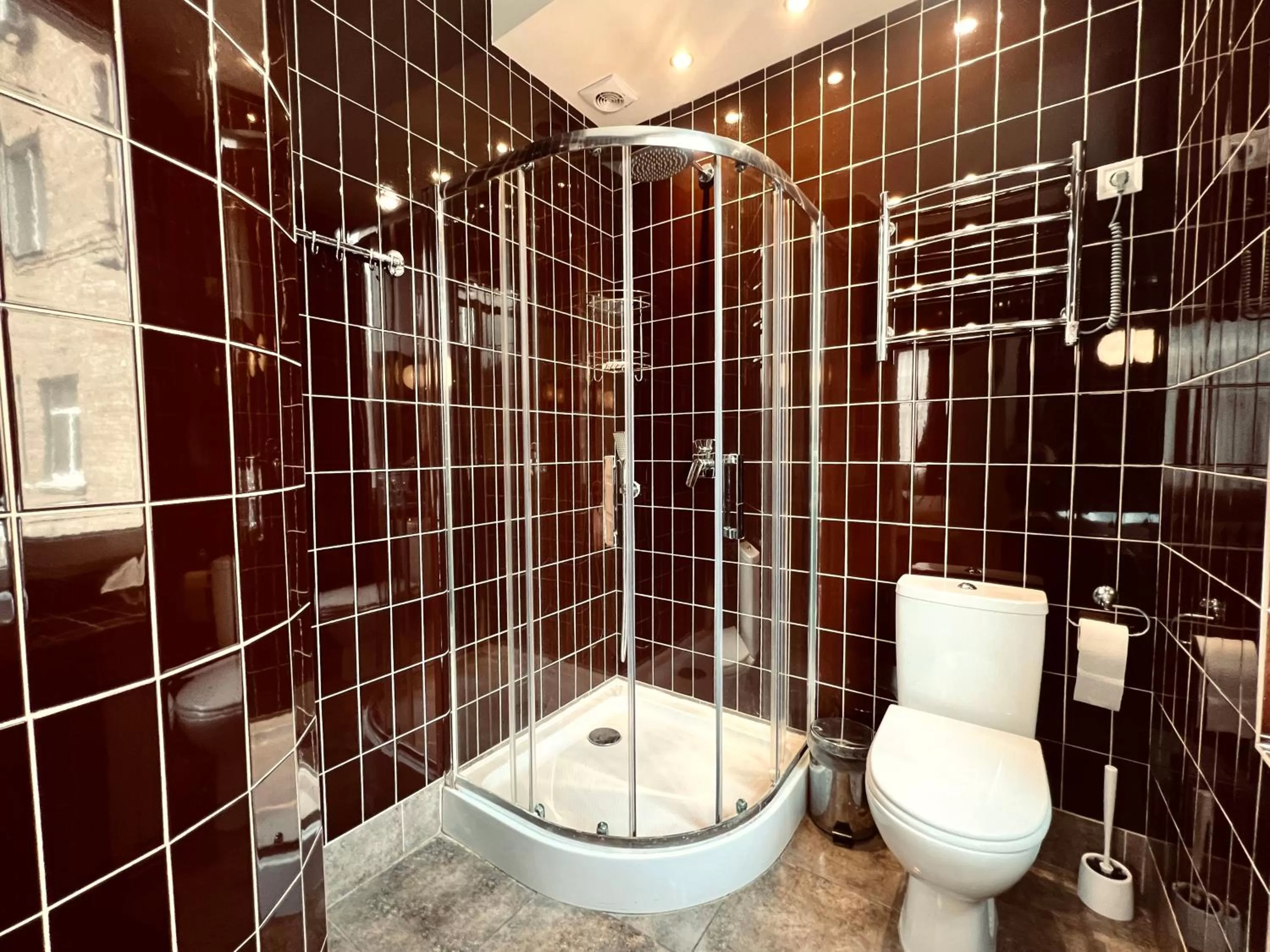 Shower, Bathroom in Kyiv Panorama Apartments near Gulliver