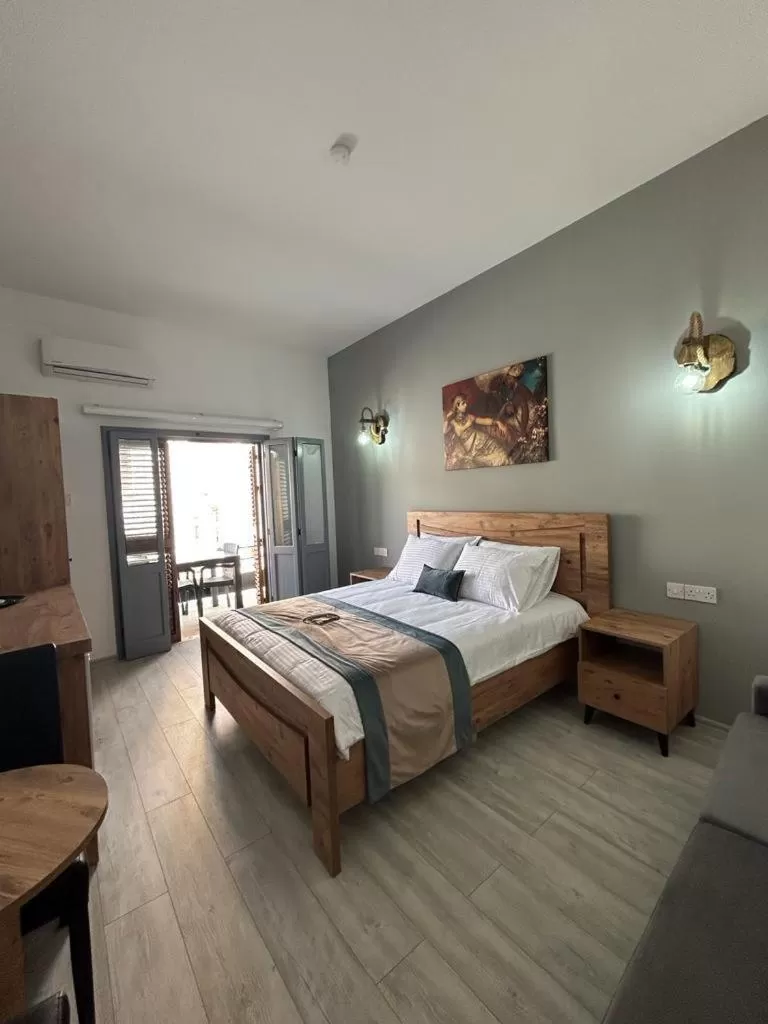 Bed in Royal Goddess Guest House, Walled City