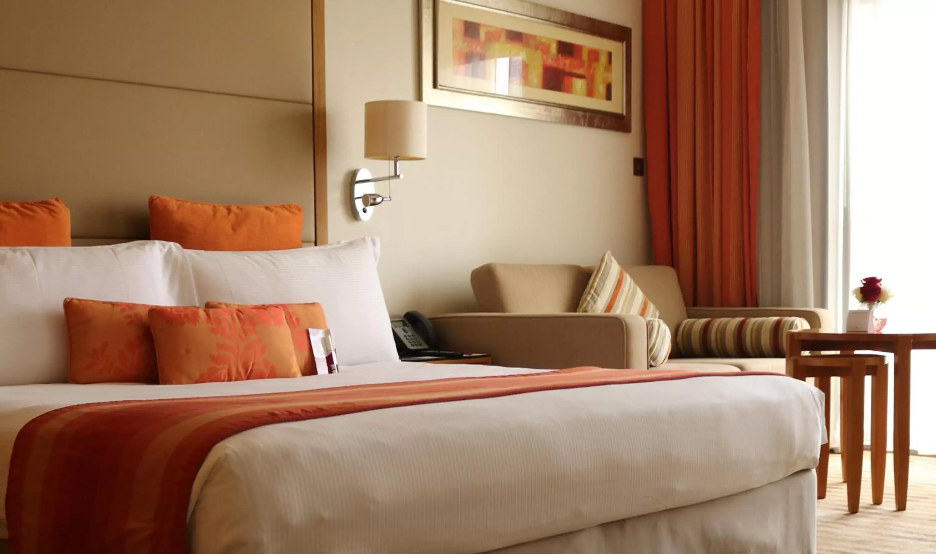 Standard King Room with Sofa Bed and Balcony in Crowne Plaza Sohar by IHG Standard King Room with Sofa Bed and Balcony in Crowne Plaza Sohar by IHG