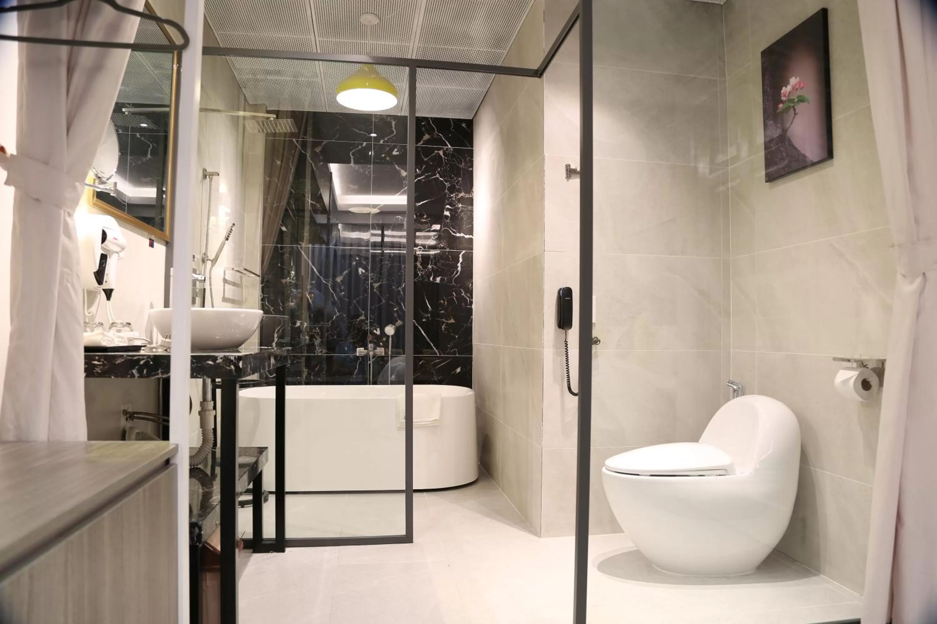 Bathroom in THE QUEENDOR BOUTIQUE HOTEL