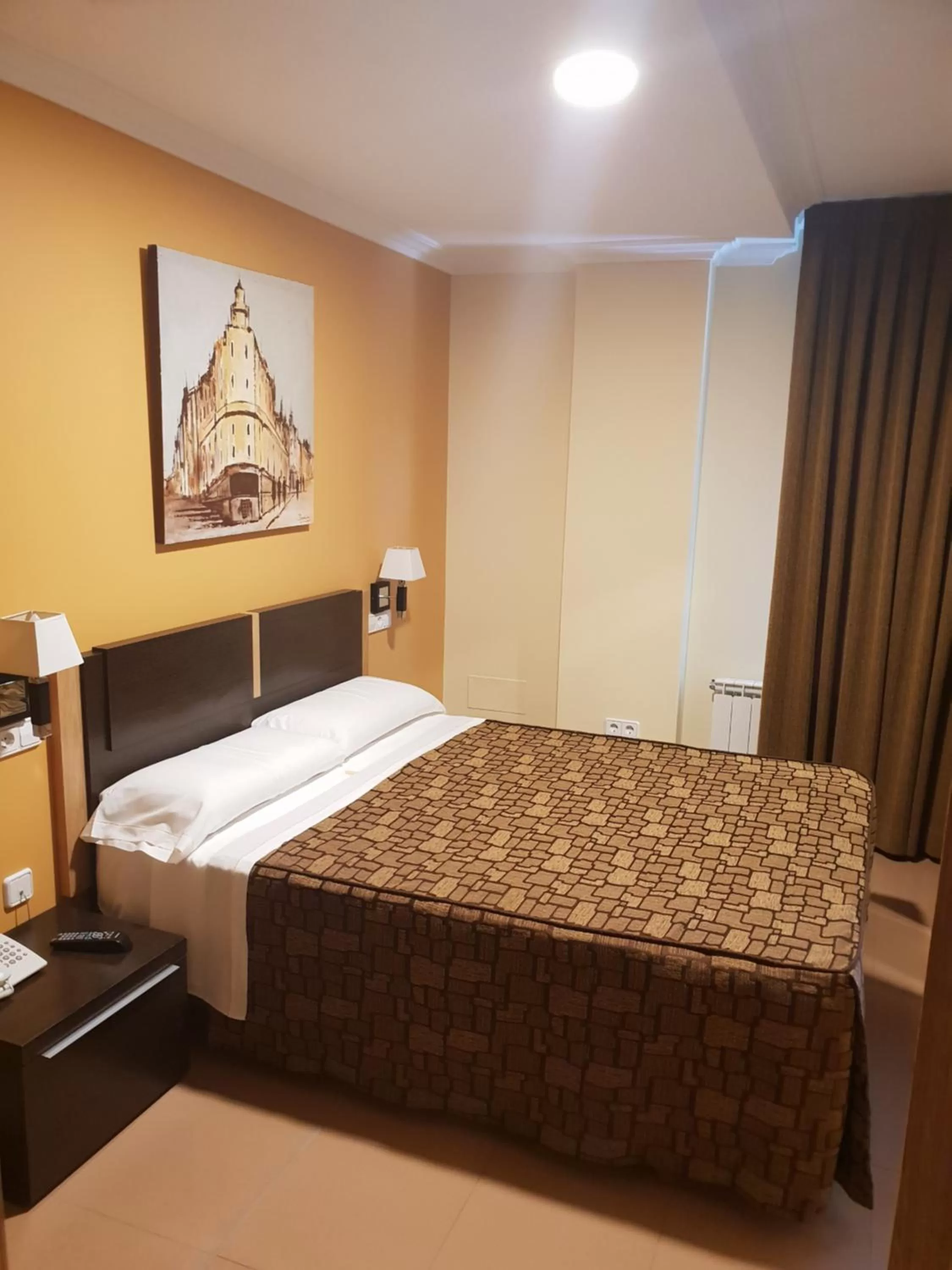 Bed in Hotel Reigosa