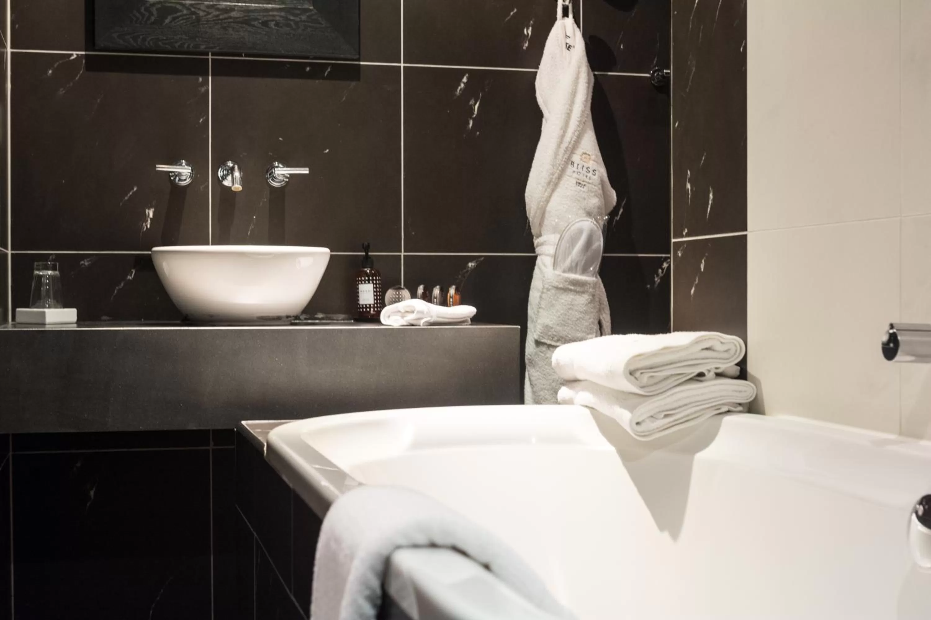 Bathroom, Bed in Bliss Boutique Hotel