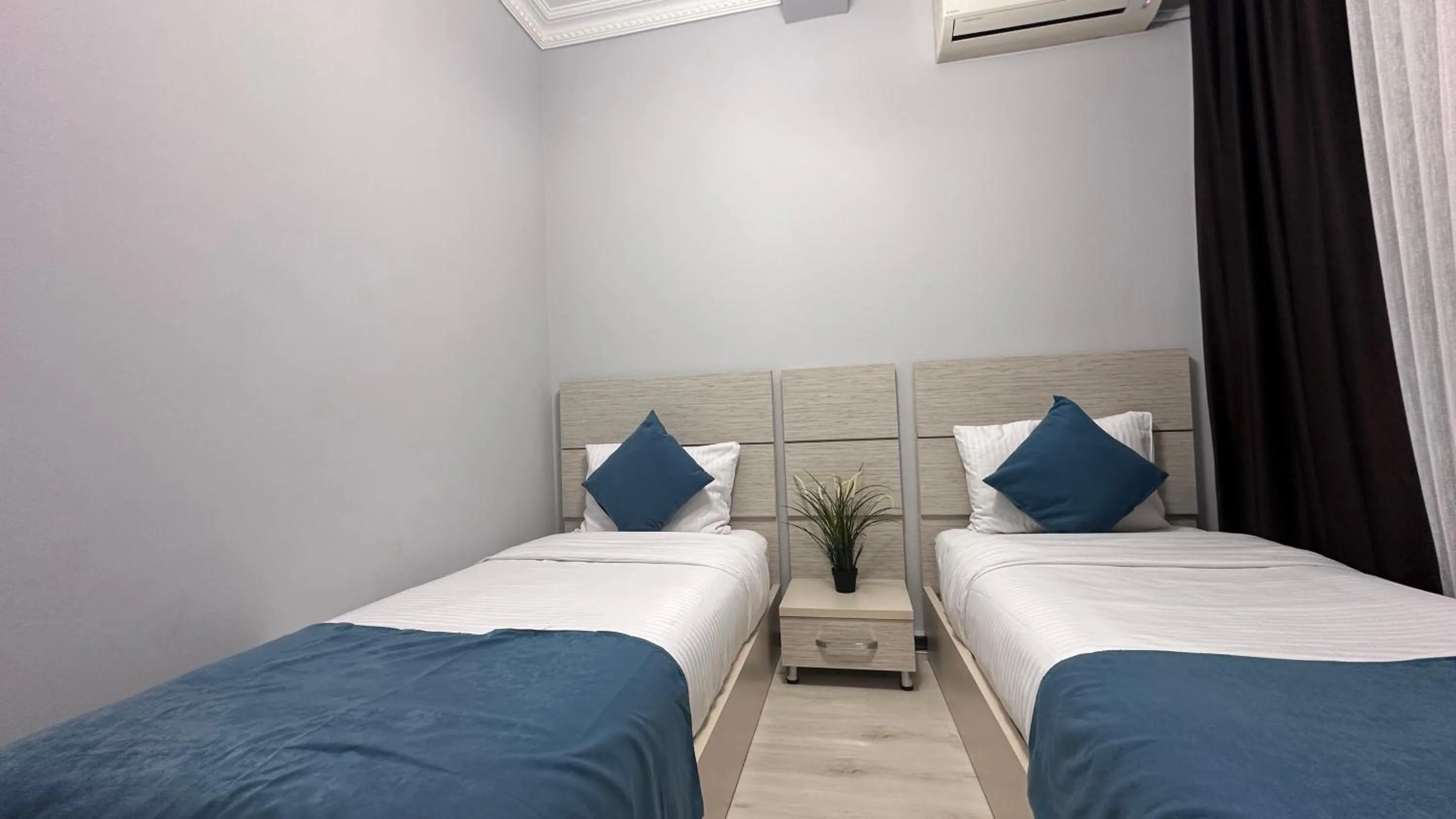 Bed in Overland Residence