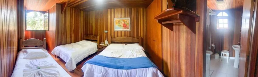 Bed in Pousada da Lua