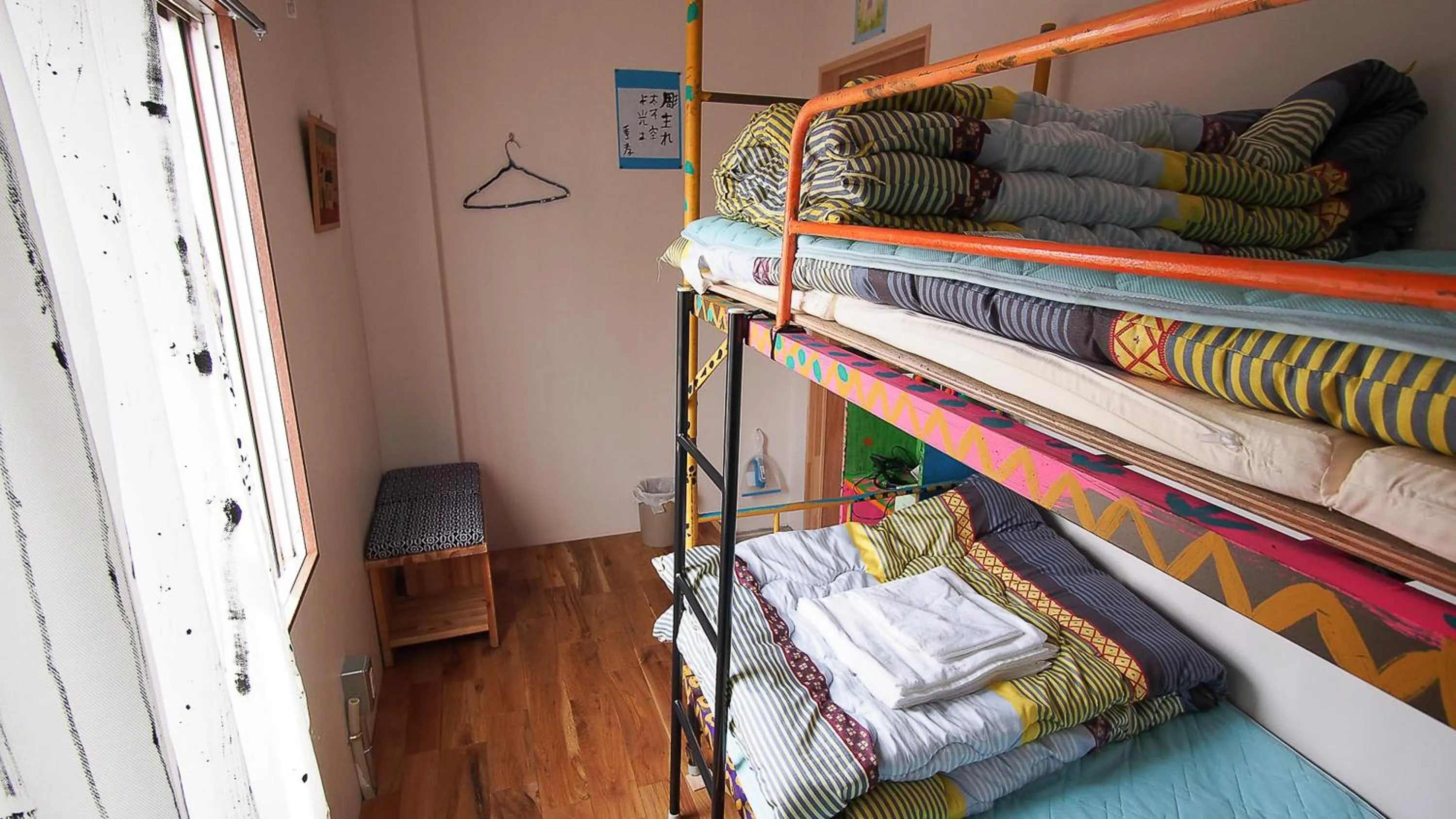 Photo of the whole room, Bed in Kamagasaki University of the Arts Cafe Garden Guest House aka Cocoroom