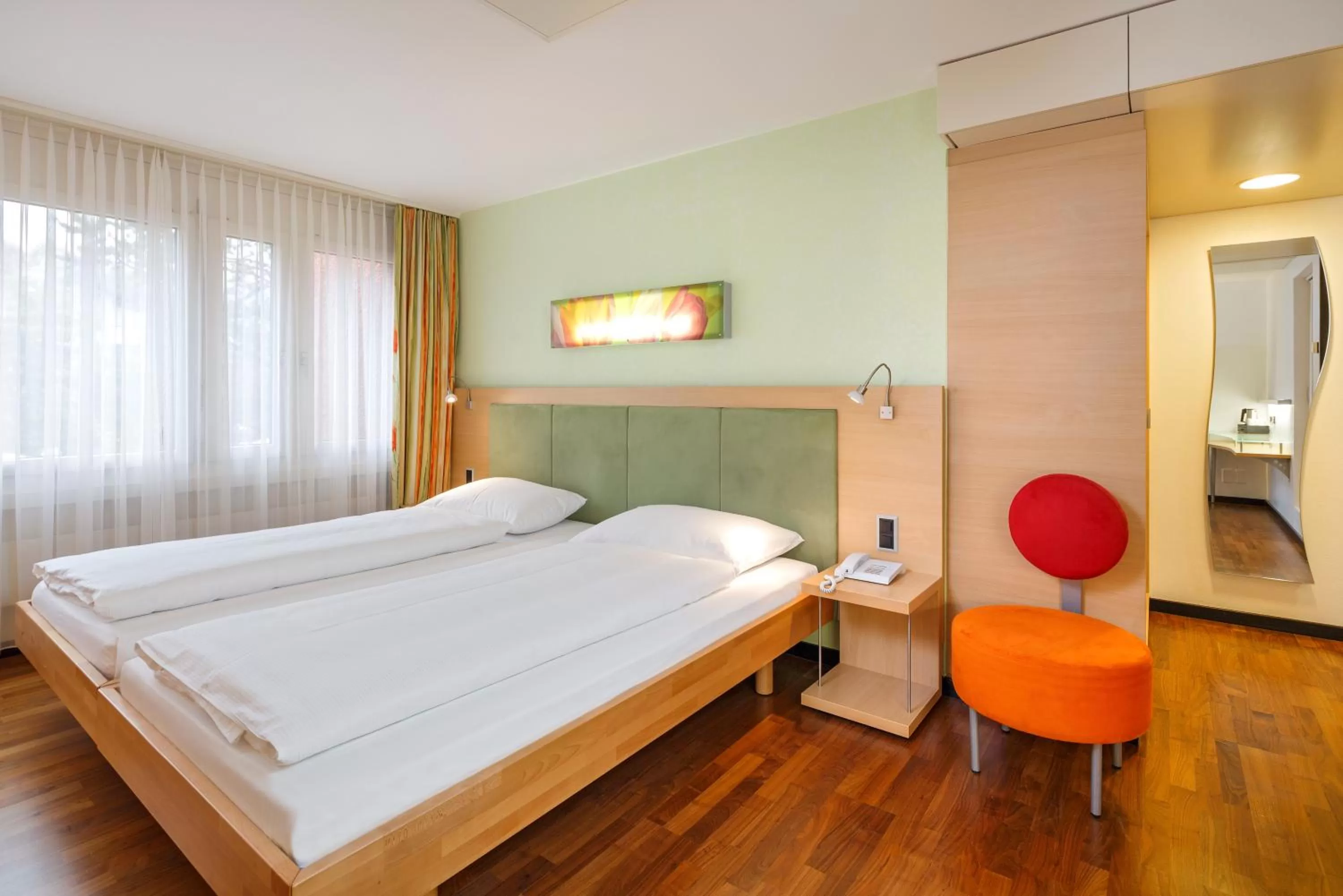 Photo of the whole room, Bed in Ramada by Wyndham Baden Hotel du Parc