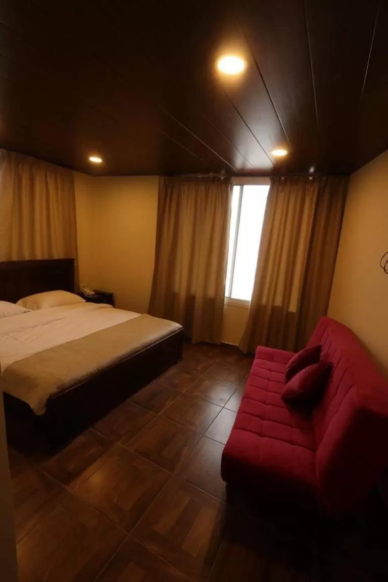 Bed in Hotel L'Aiglon