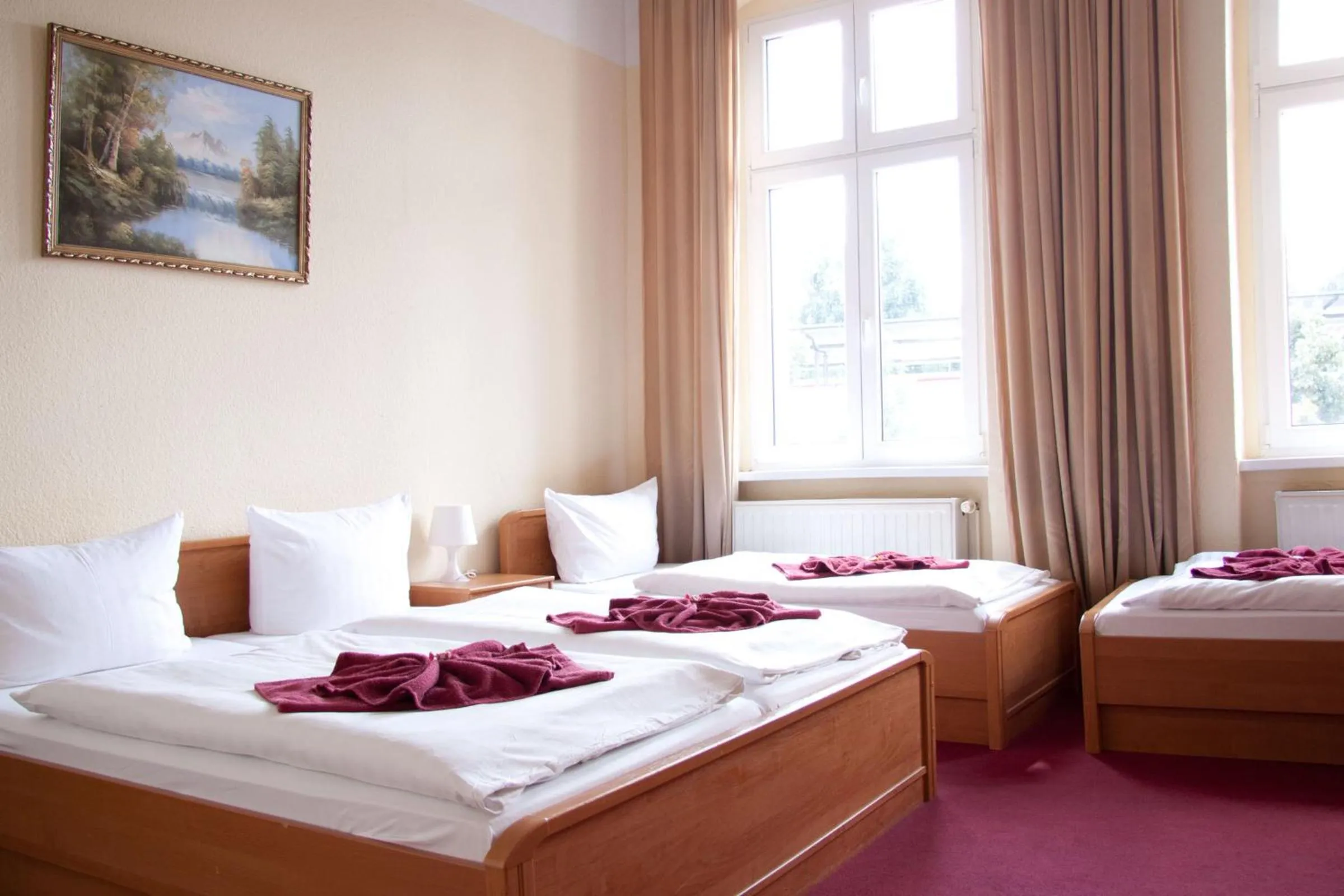 Quadruple Room in Hotel AI Königshof