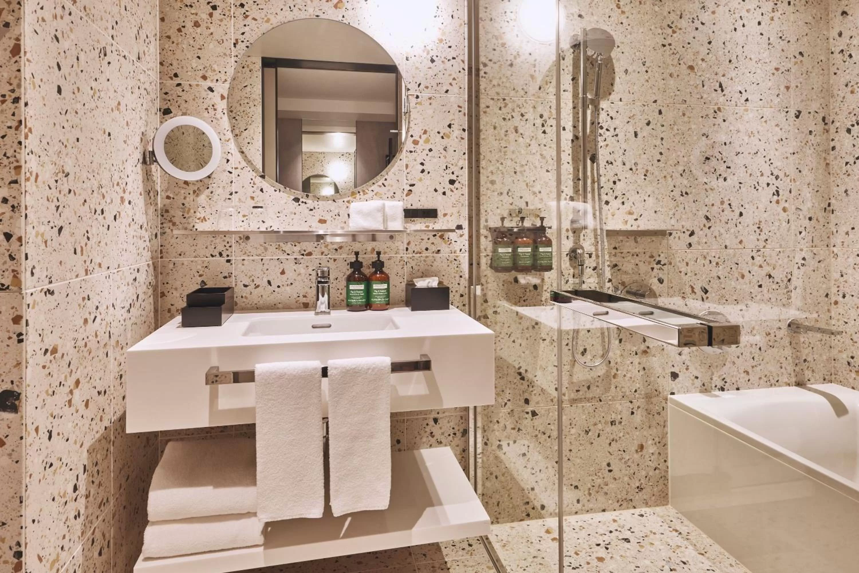 Bathroom in voco Osaka Central by IHG