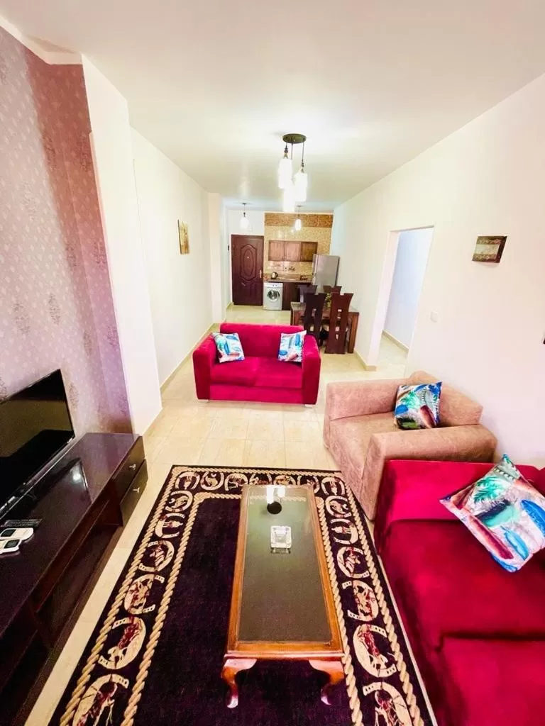 Communal lounge/ TV room, Seating Area in Charbel apartments
