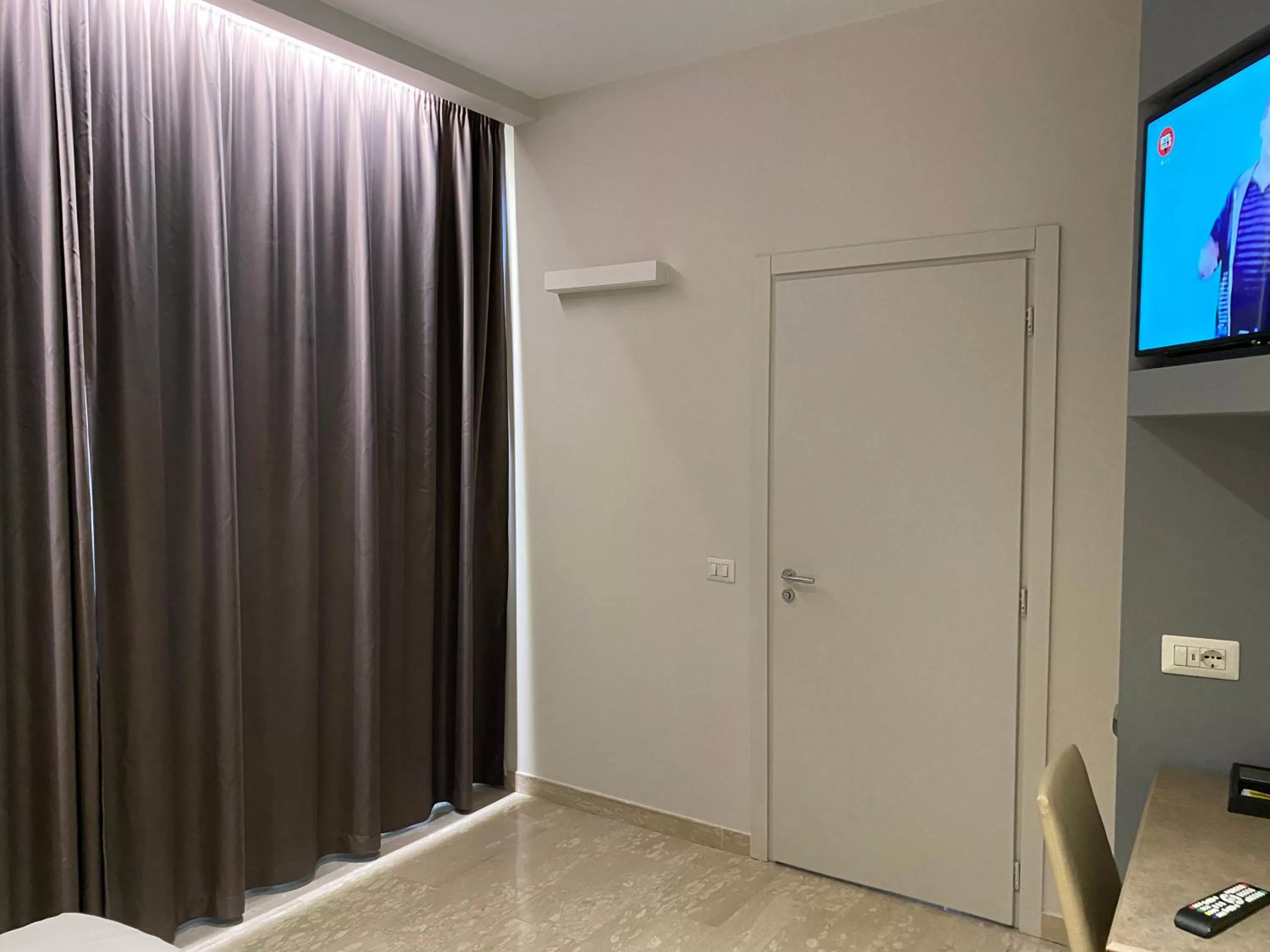 Bedroom in Oasi Village Hotel