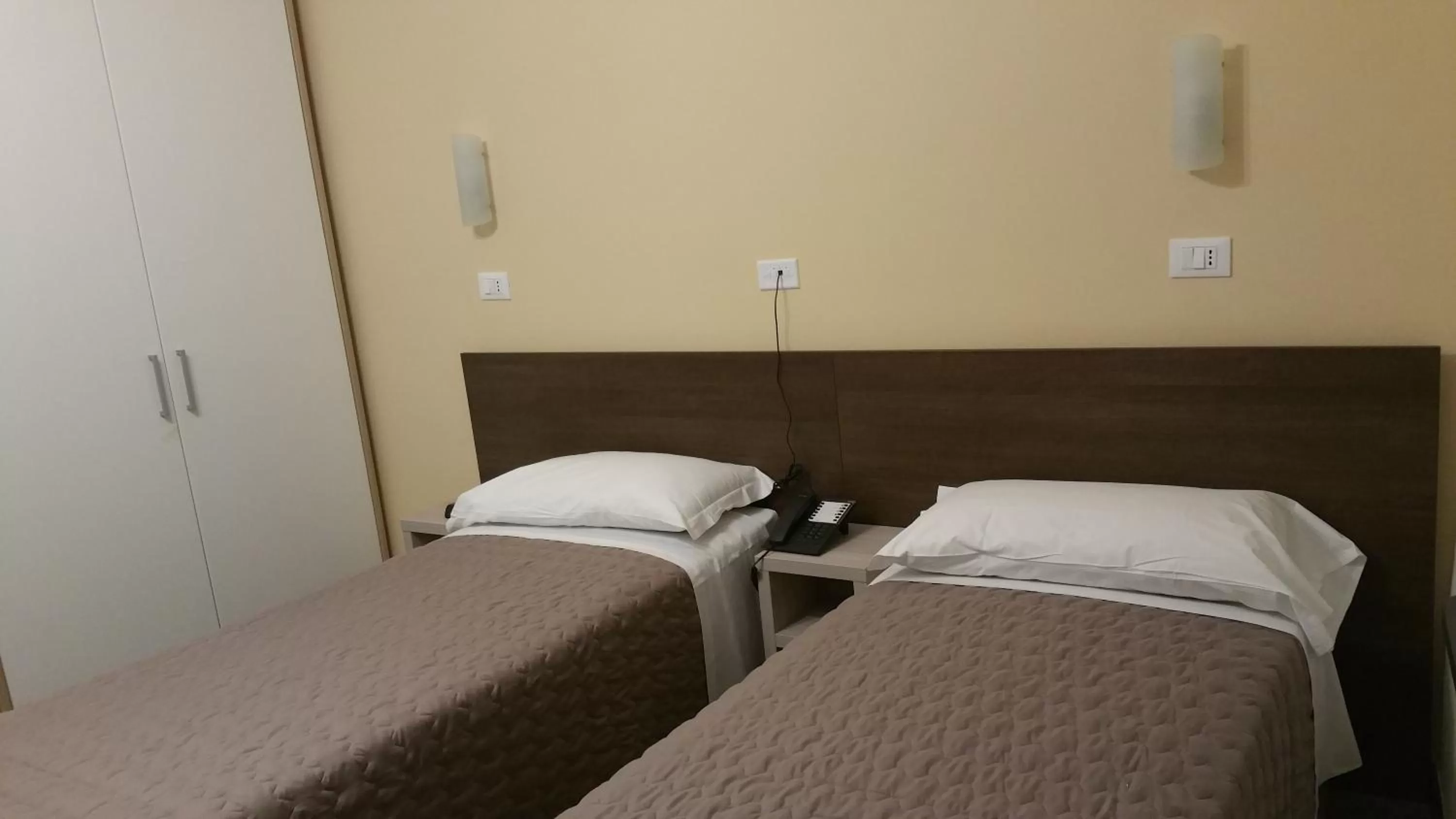 Bed in Hotel Tommaseo