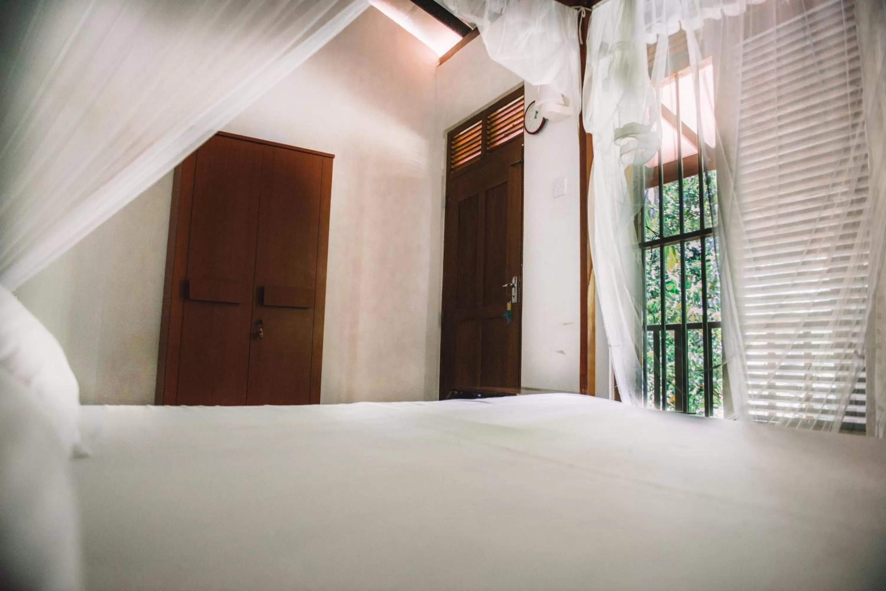 Bed in Kadolana Guest House