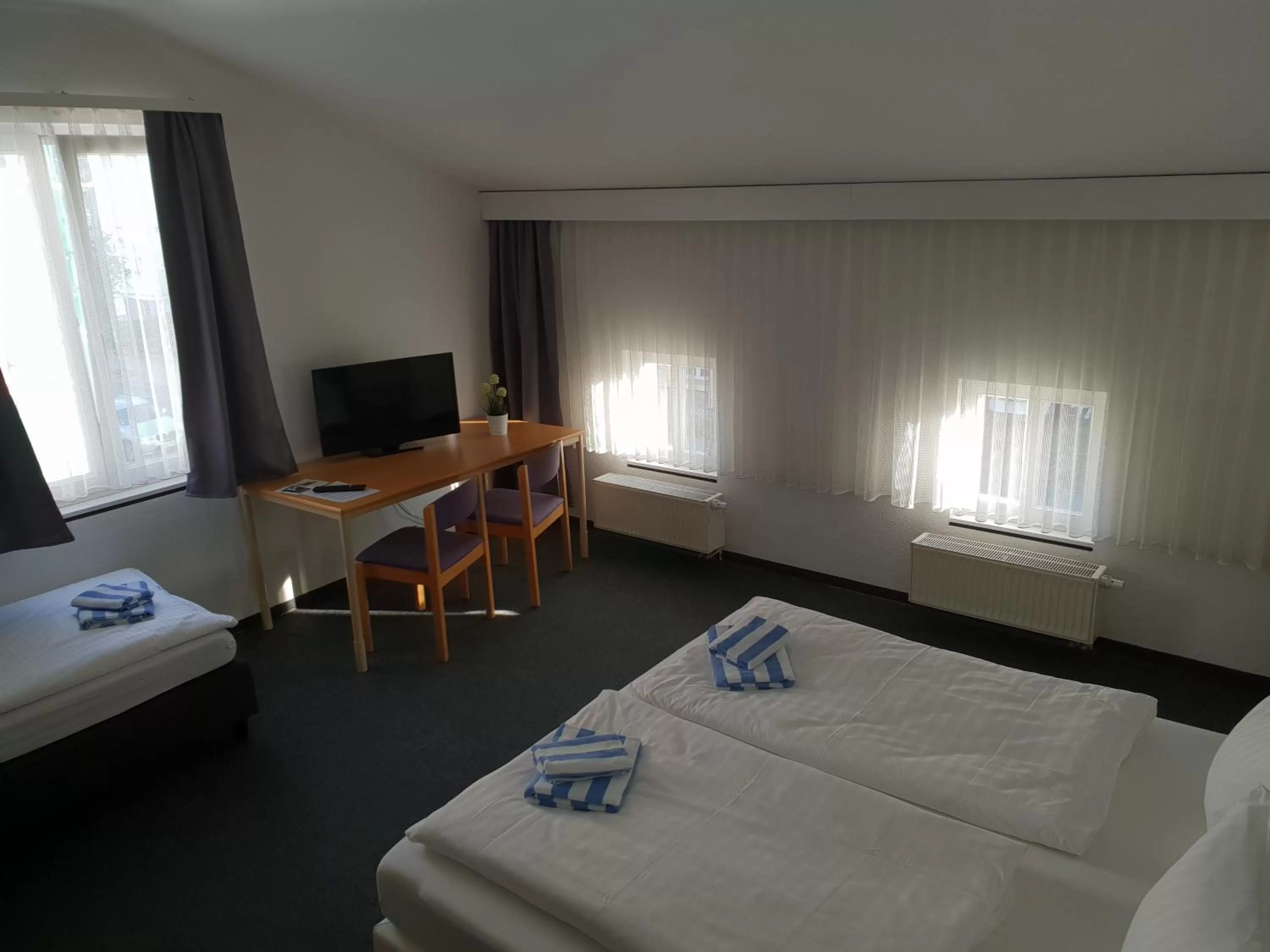 Bed in Appartement-Hotel Rostock