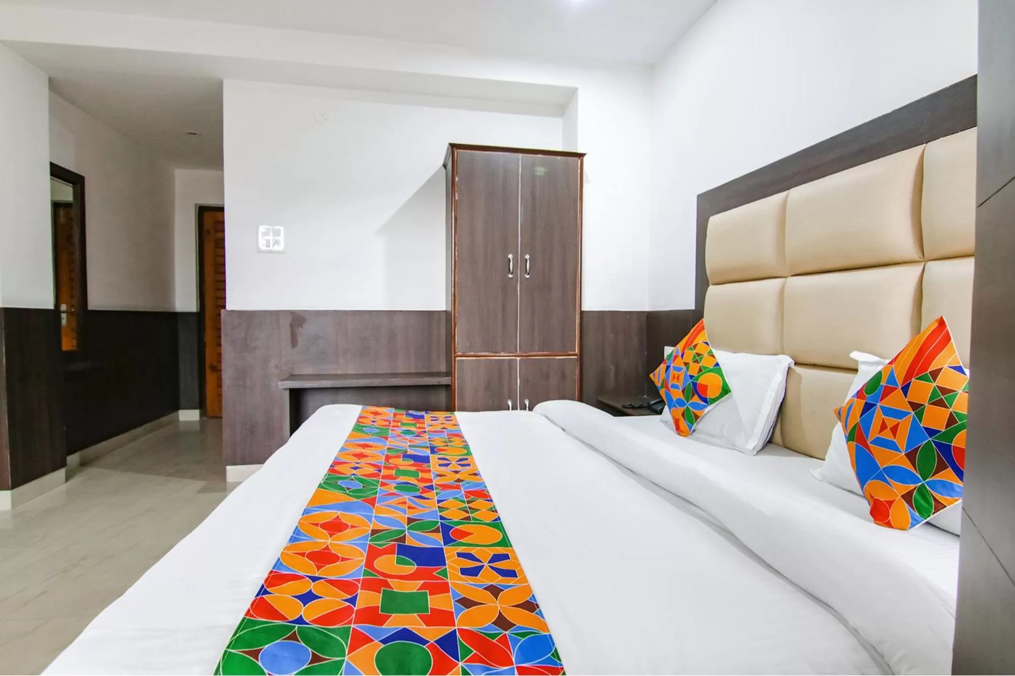 Bed in FabHotel Rosewood Inn I