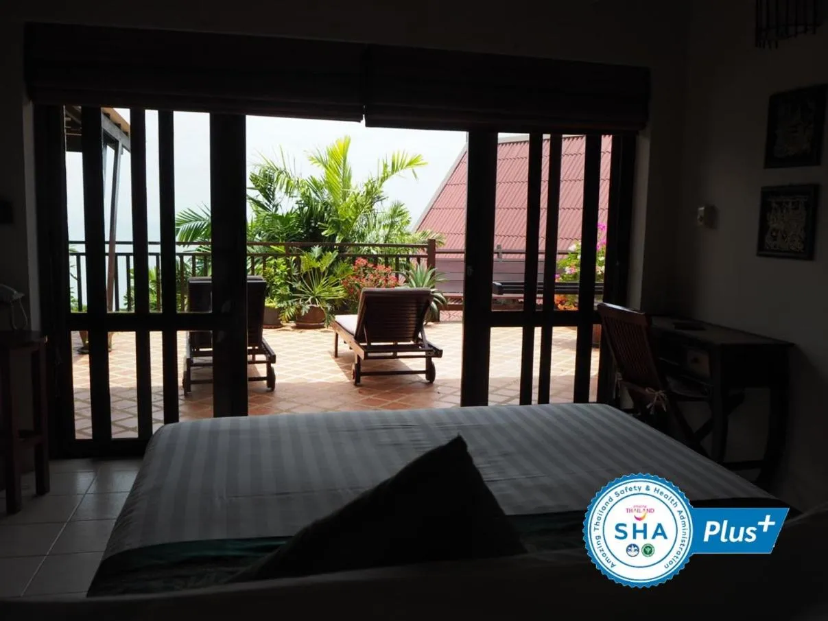 Seating area, Bed in Baan KanTiang See Villas - SHA Extra Plus