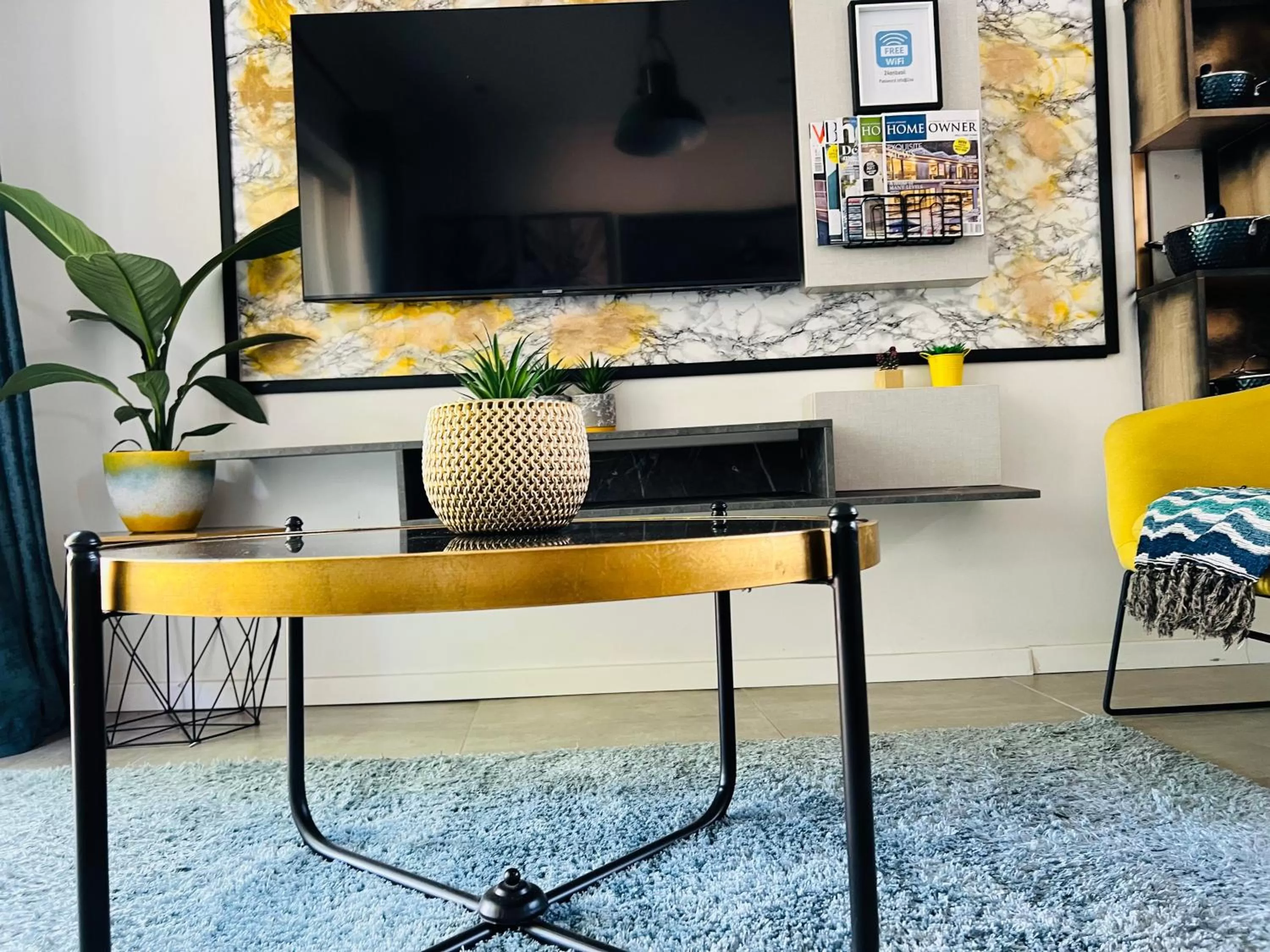 TV/Entertainment Center in 24 On Basil Inventive suites