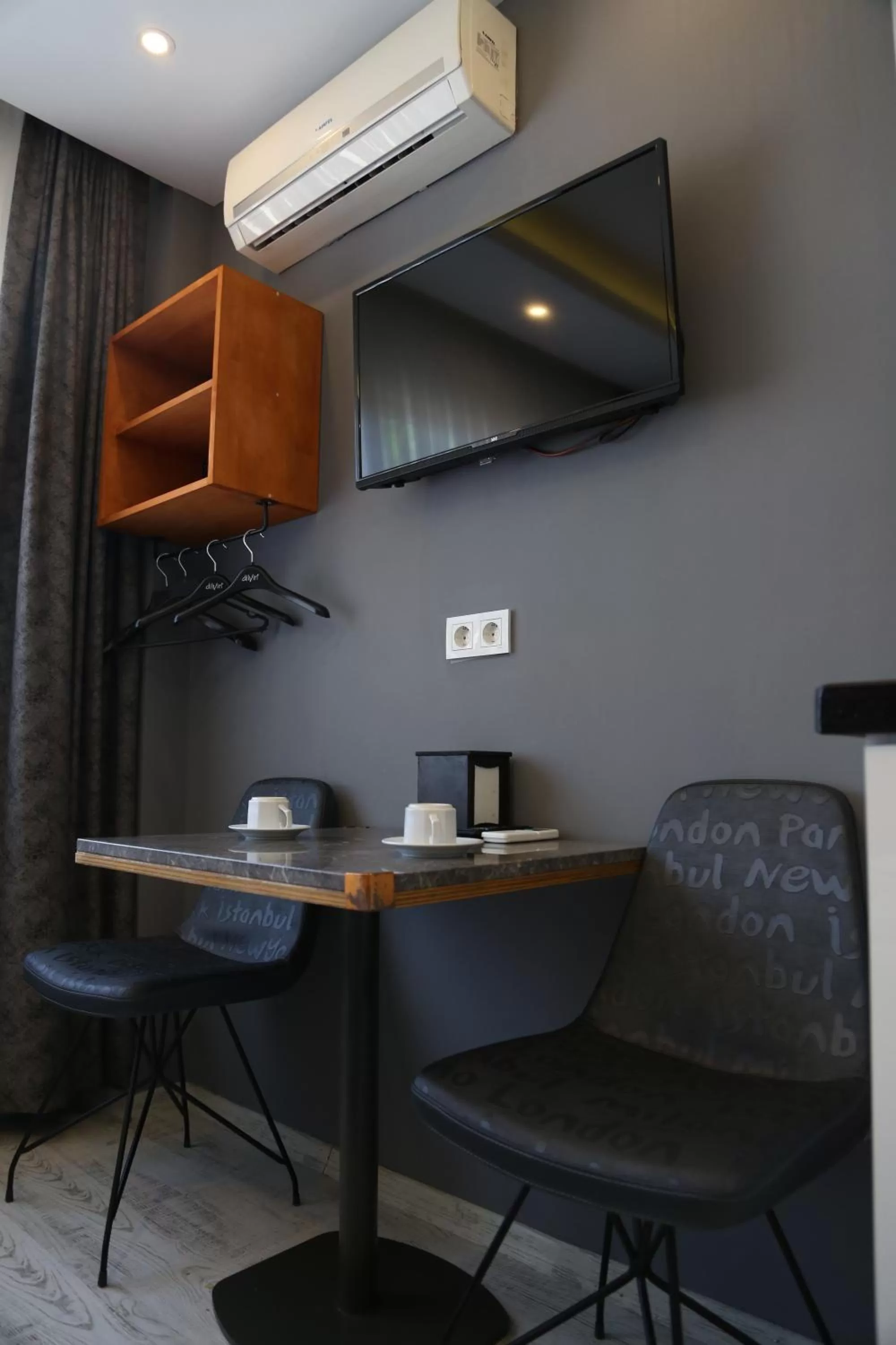 Seating area, TV/Entertainment Center in Arat Apartments