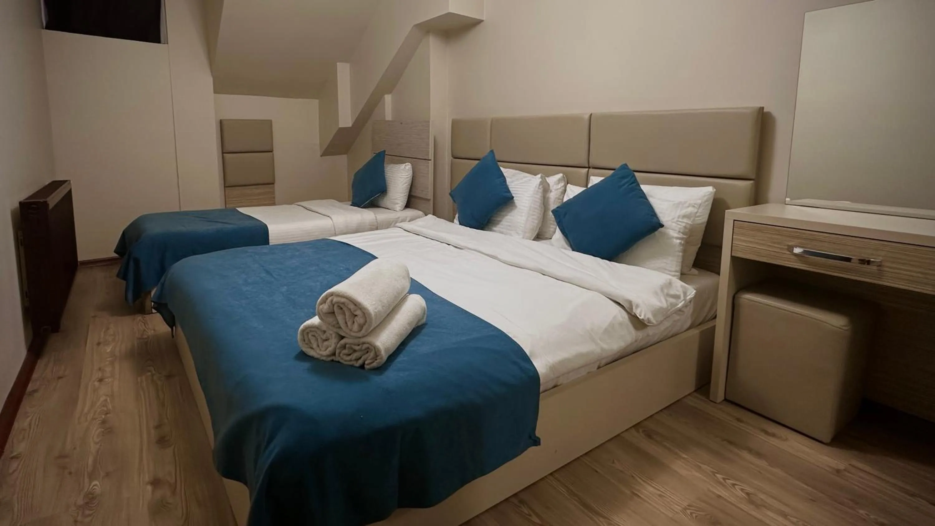 Bed in Overland Residence