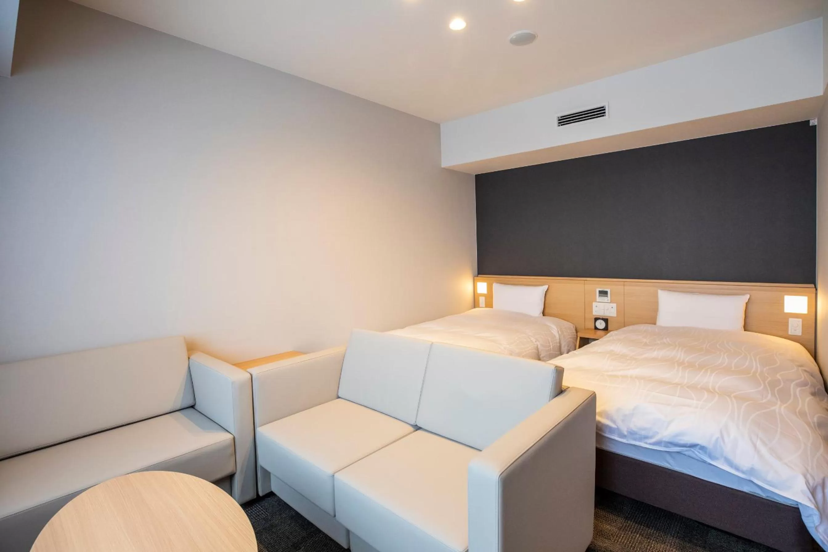 Photo of the whole room, Bed in La Vista Furano Hills Natural Hot Spring