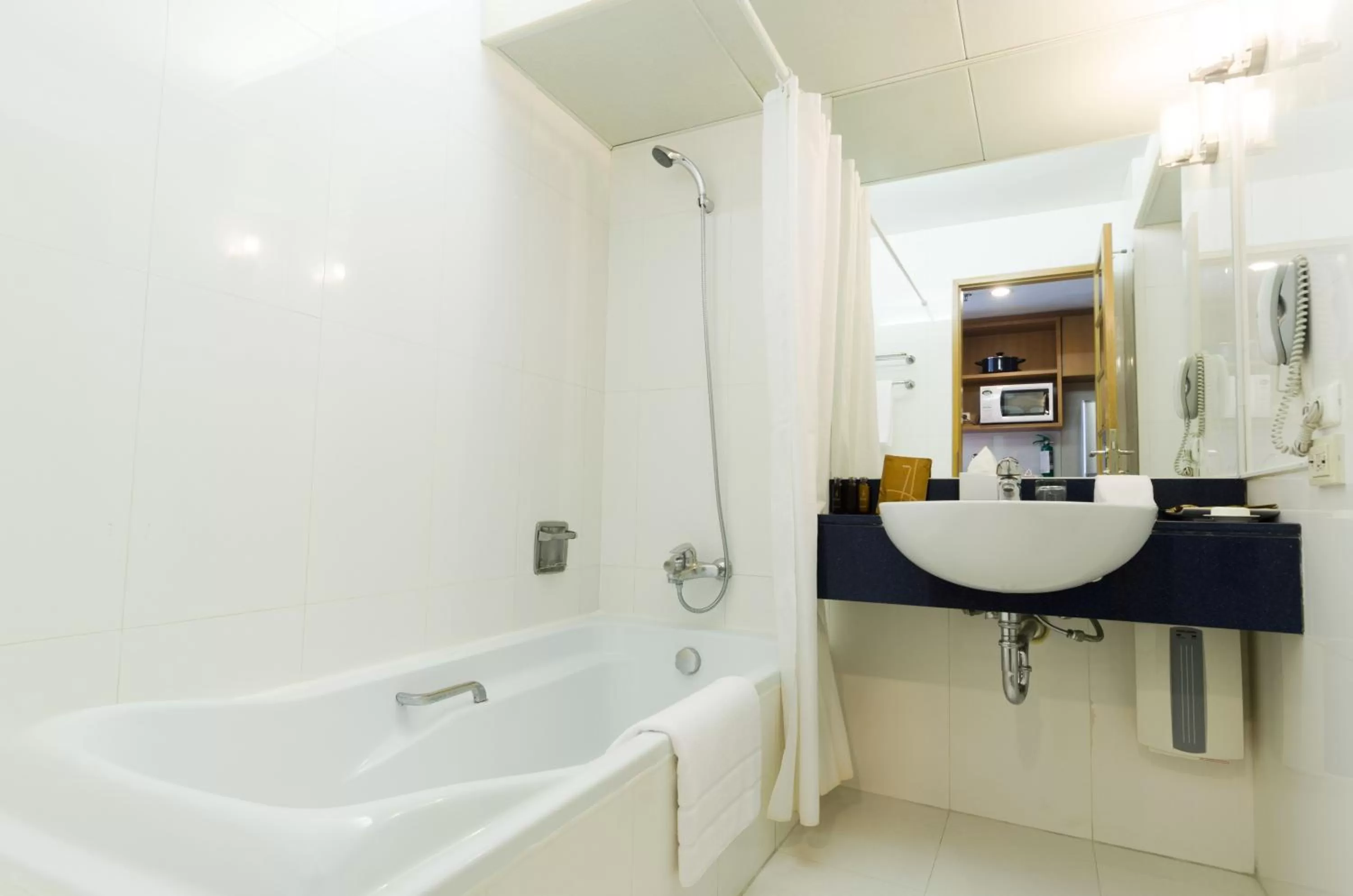 Bathroom in AT EASE saladaeng by AETAS