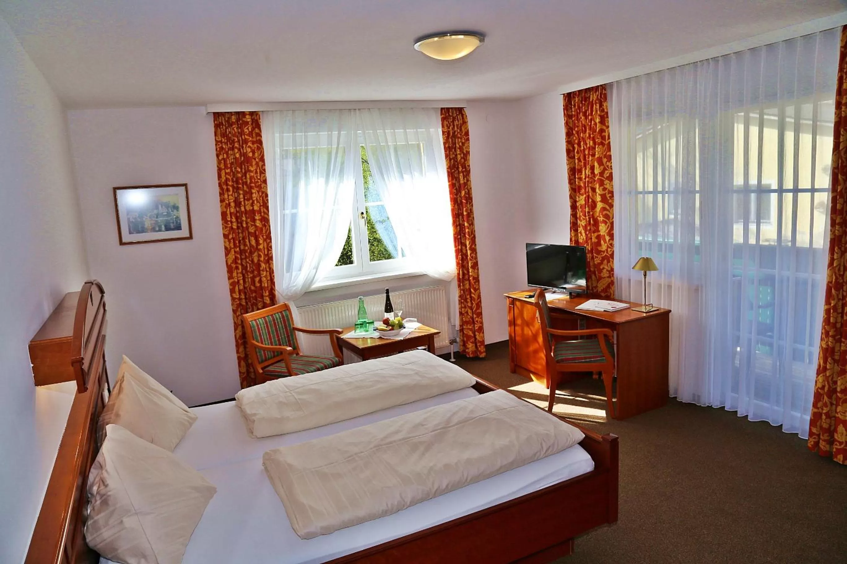 Photo of the whole room, Bed in Landhotel Post Ebensee am Traunsee ***S