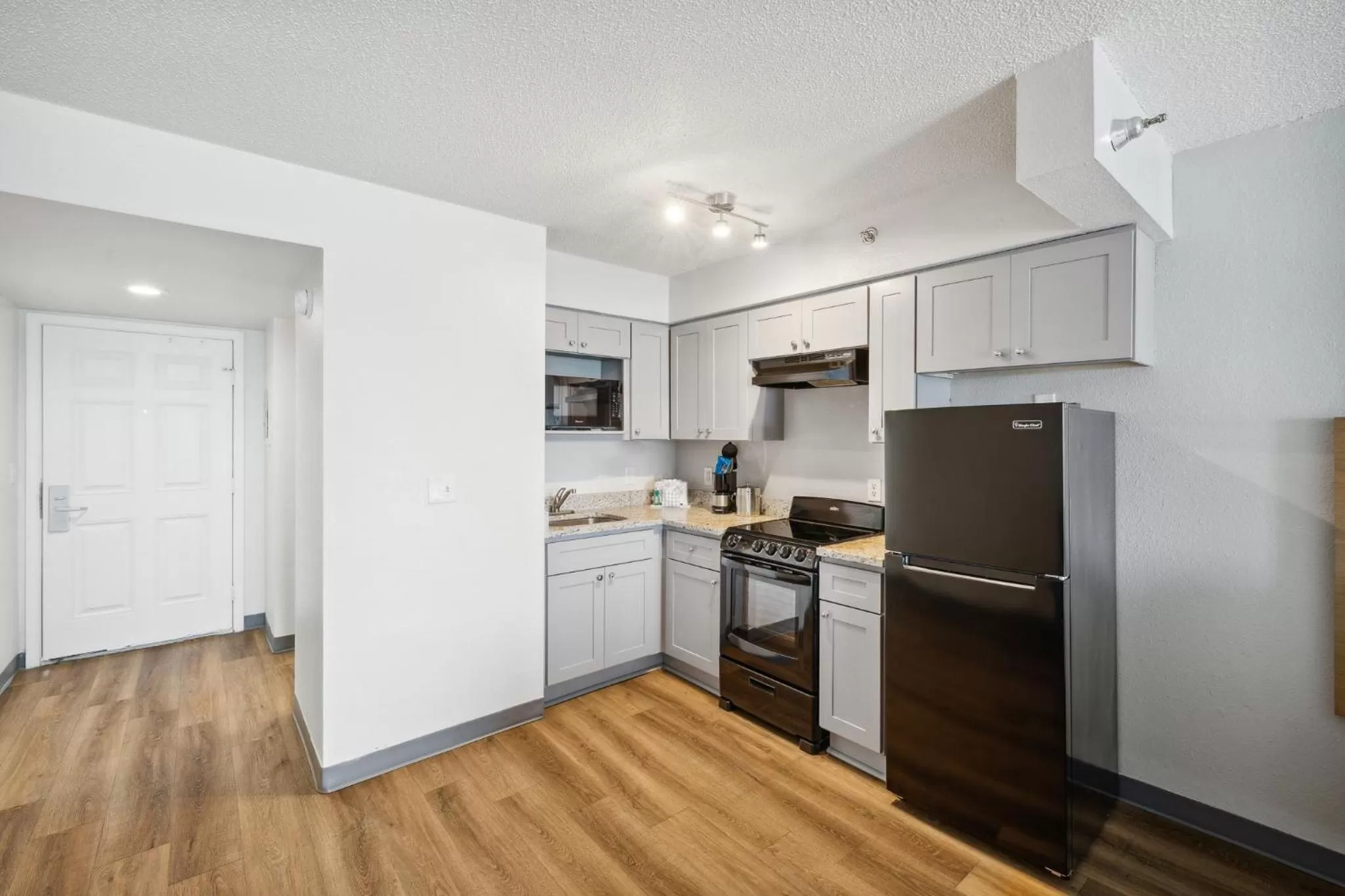 kitchen in Sugar Sands Beachfront Hotel, a By The Sea Resort