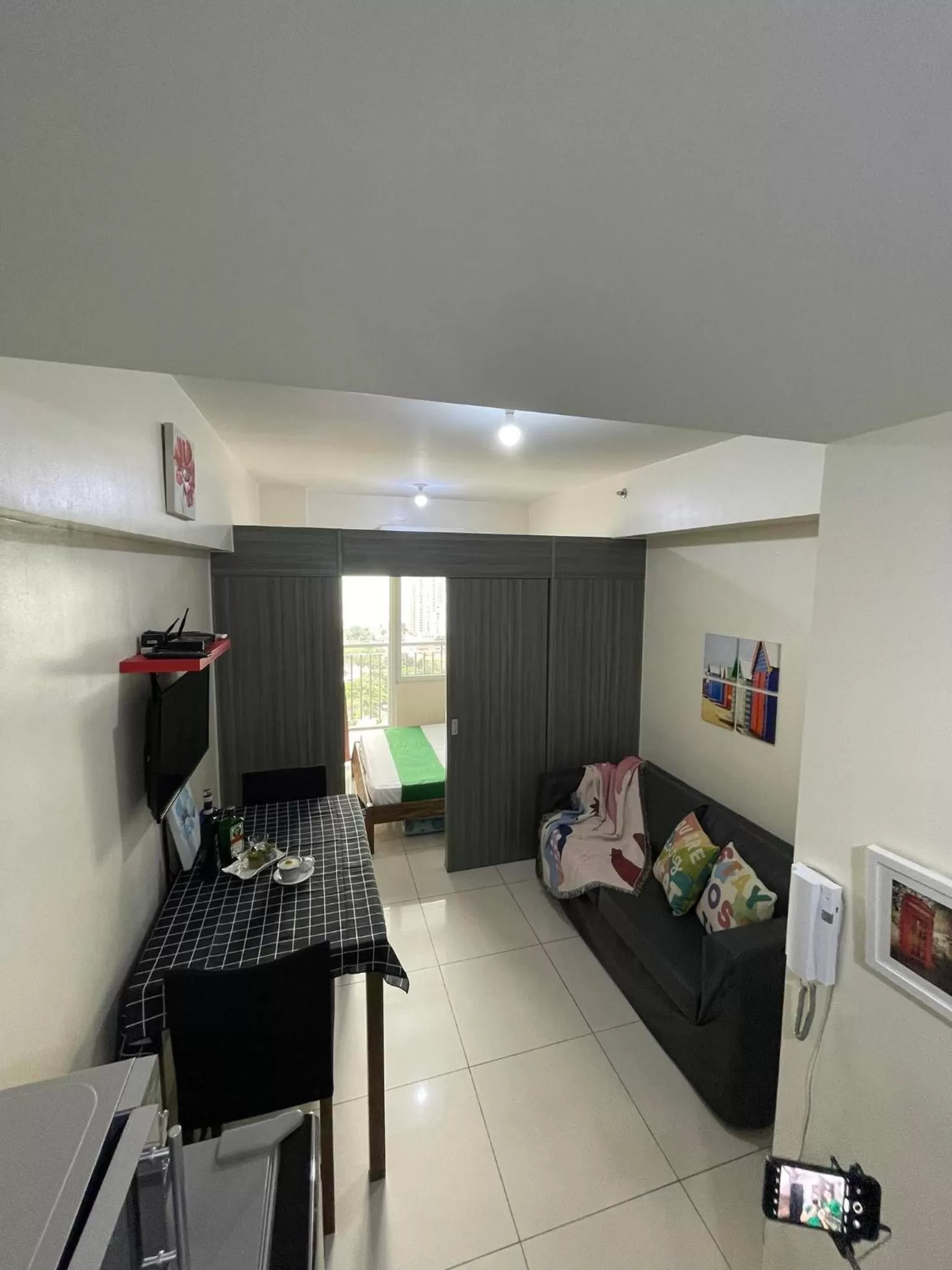 TV and multimedia in Green Residences Stays by PBYY