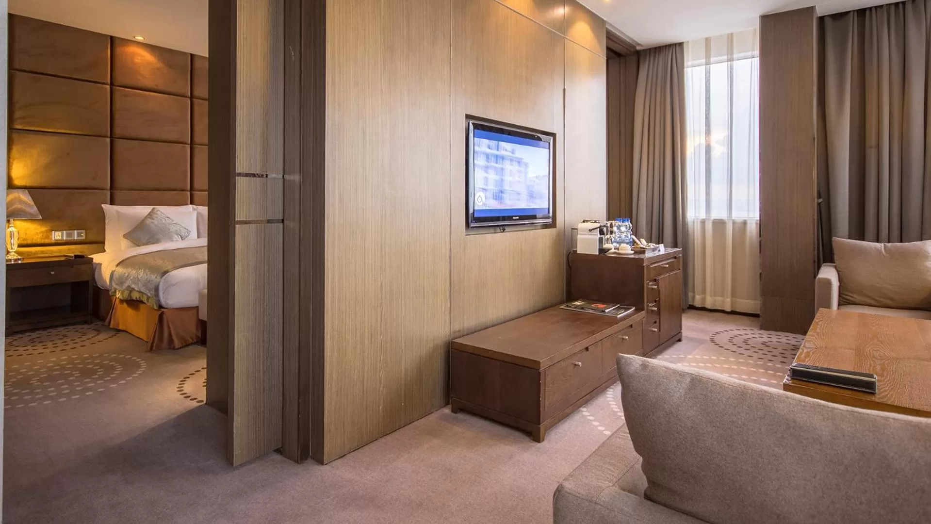 Communal lounge/ TV room, Bed in Fleuve Congo Hotel By Blazon Hotels