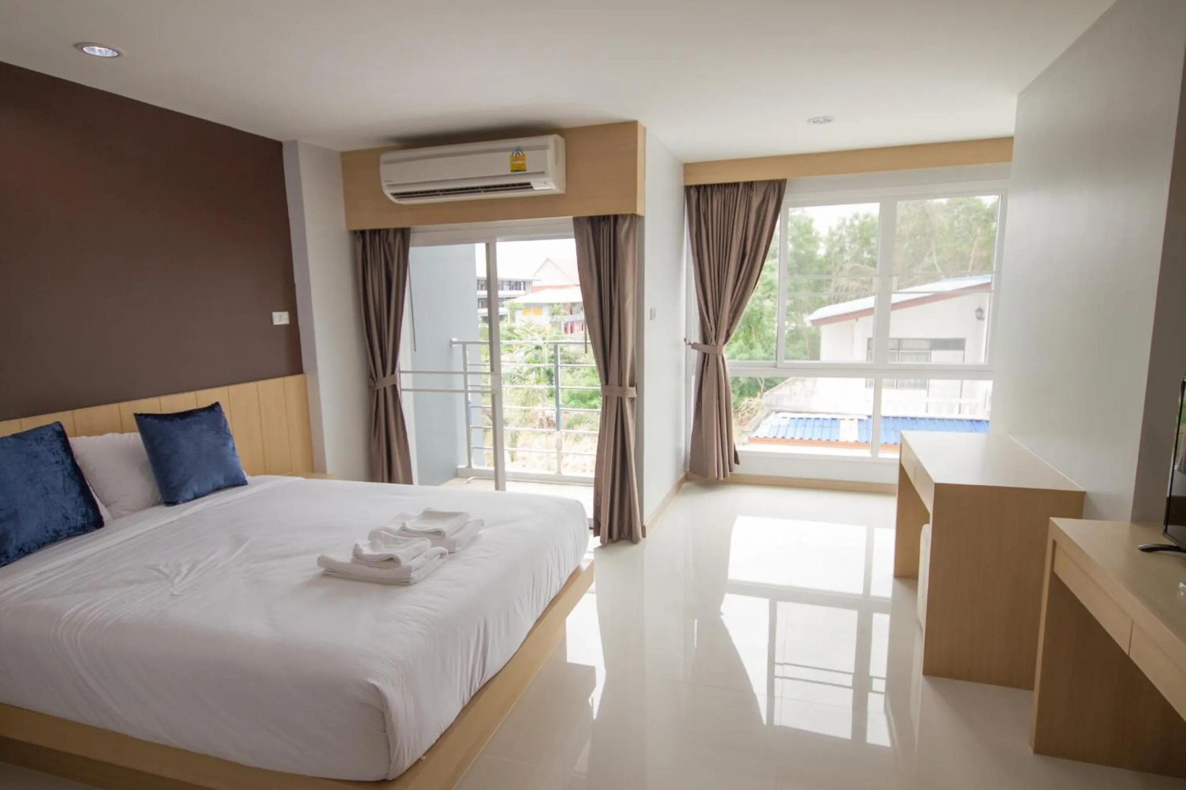 Bed in Charisma Residence