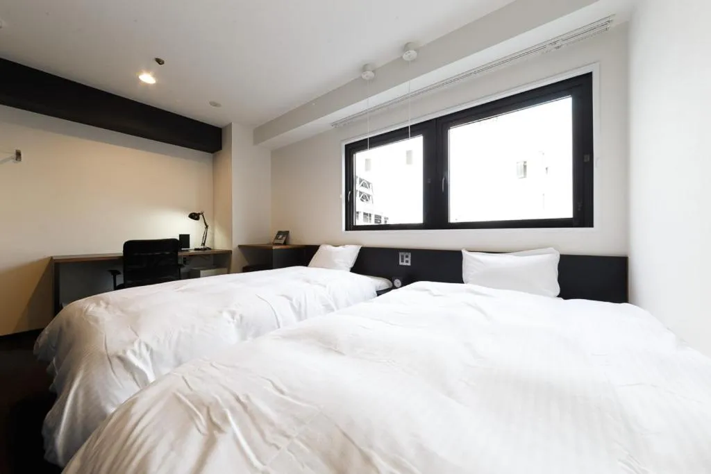 Photo of the whole room, Bed in Hotel Citio Shizuoka