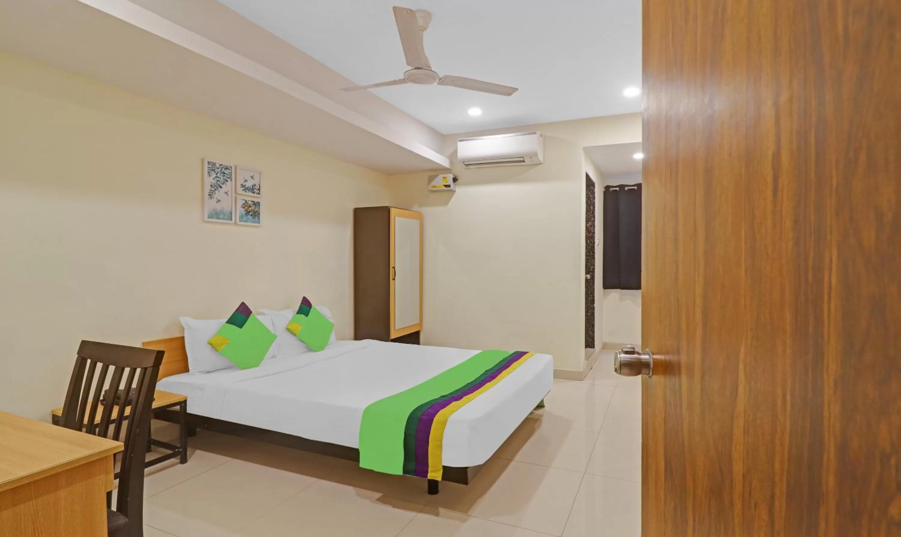 Bedroom, Bed in Treebo Trend Tee