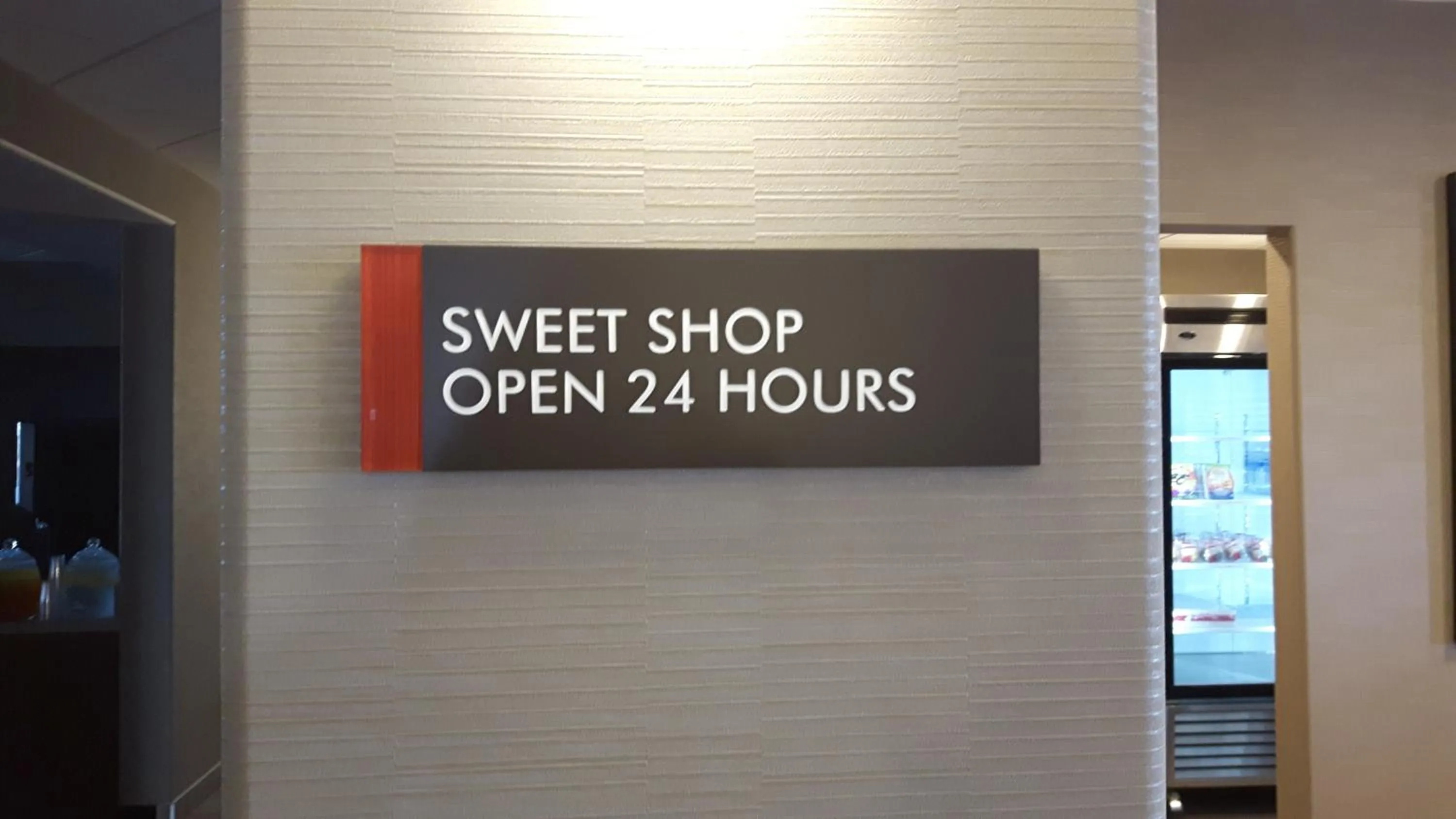 Logo/Certificate/Sign in Encore Suites by Service Plus Inns