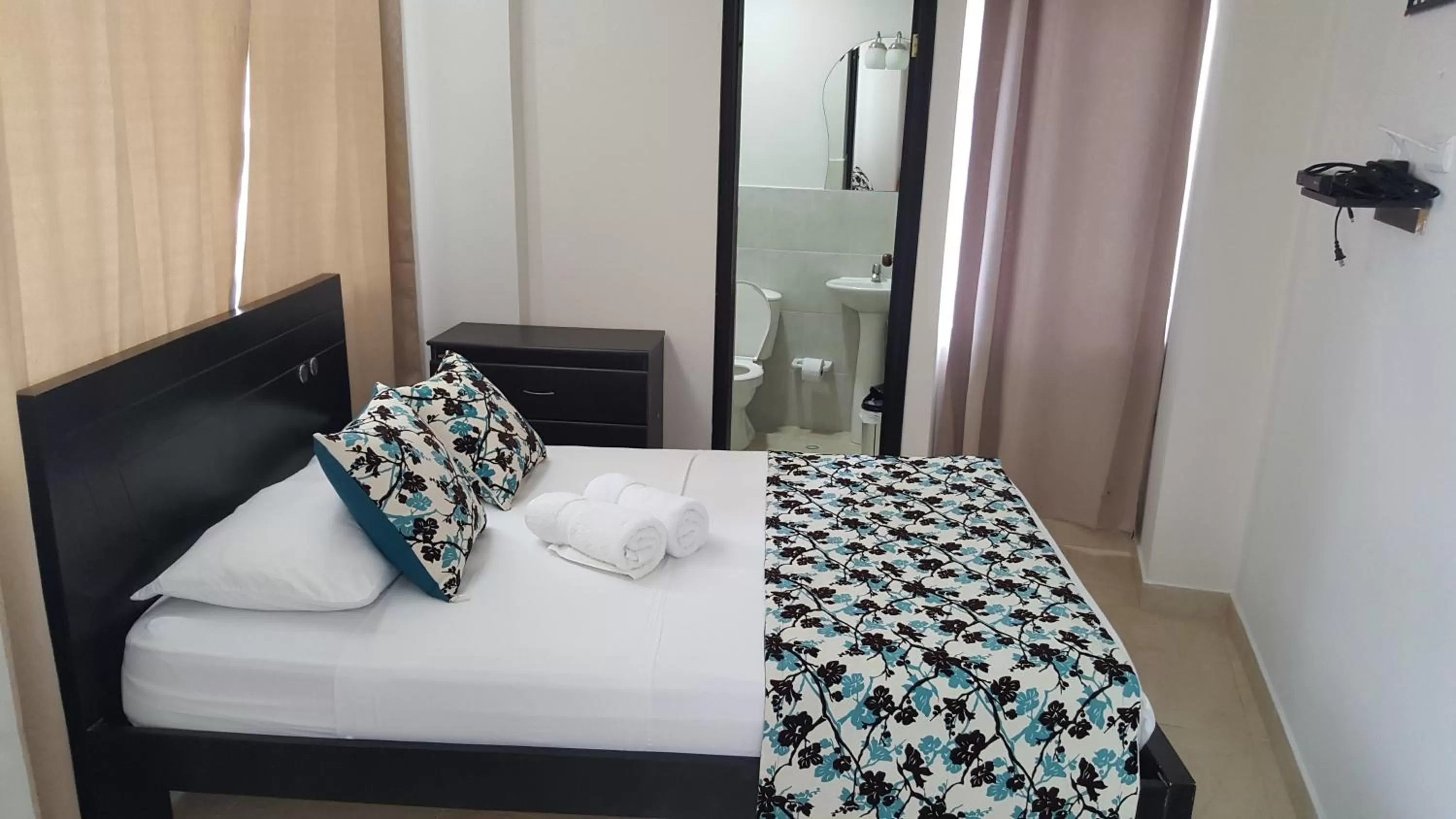 Bed in Caribbean Island Hotel Piso 2