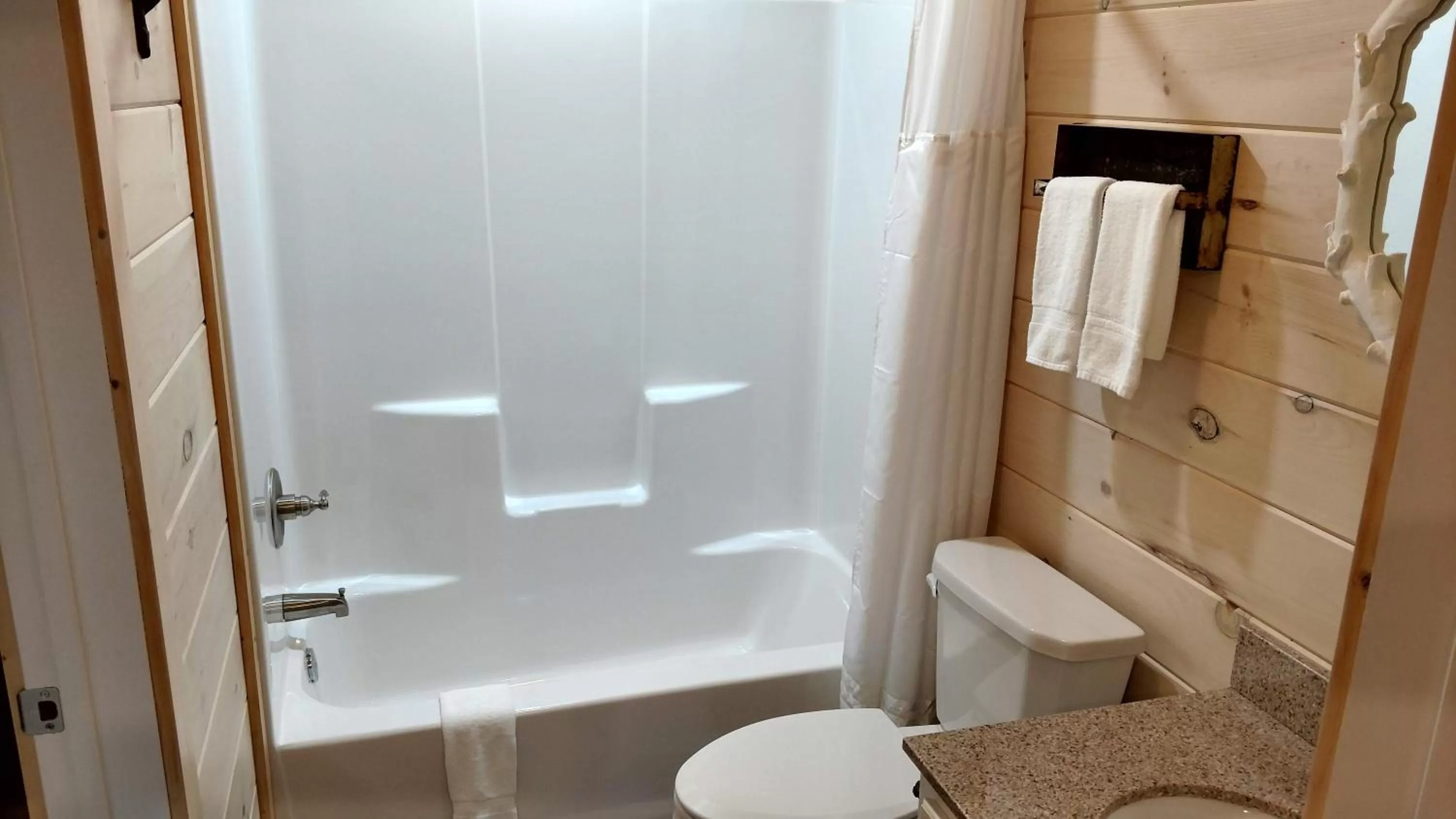 Toilet in Knotty Squirrel Cabins