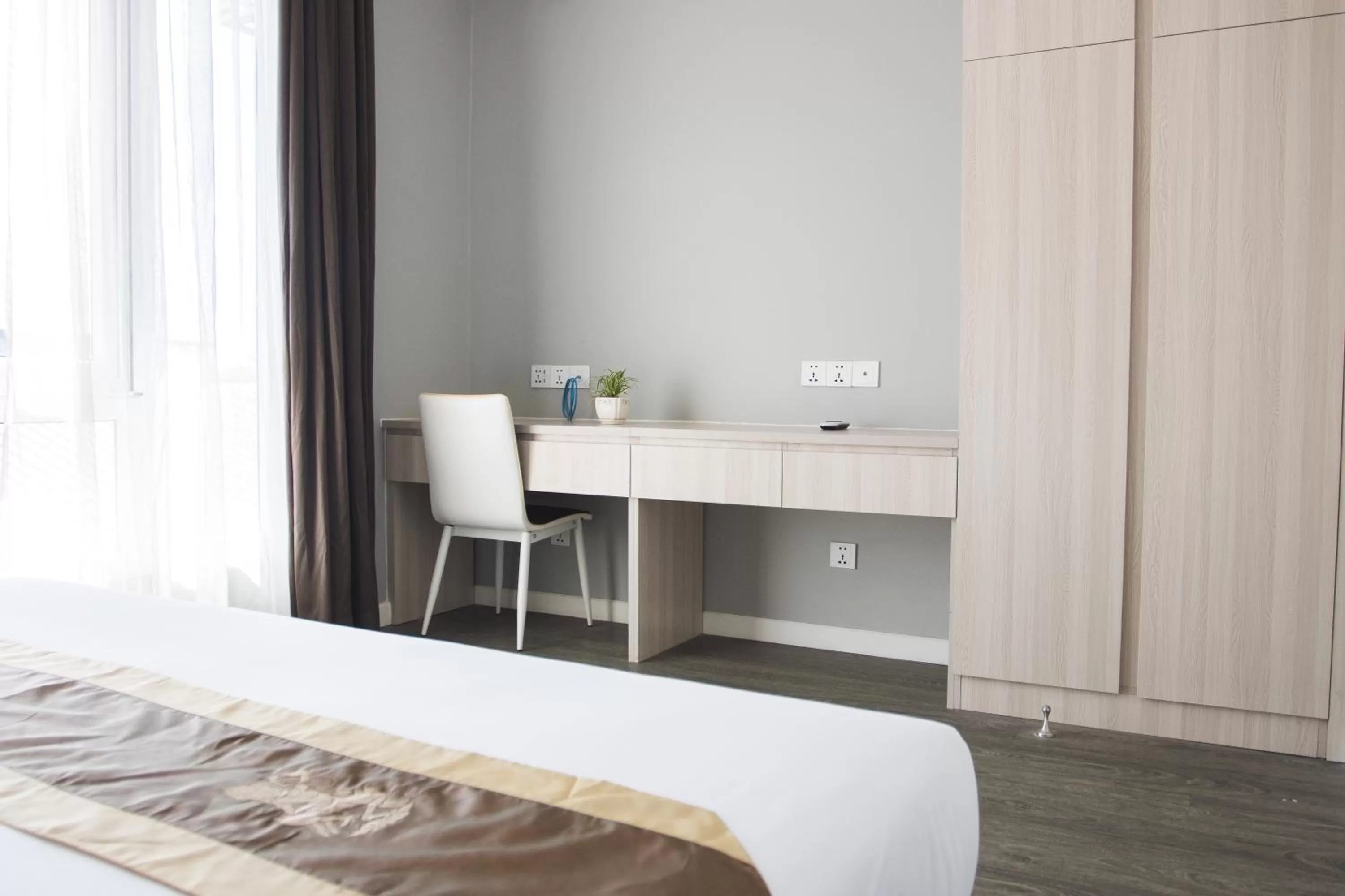 Seating area, Bed in Cambodian Country Club