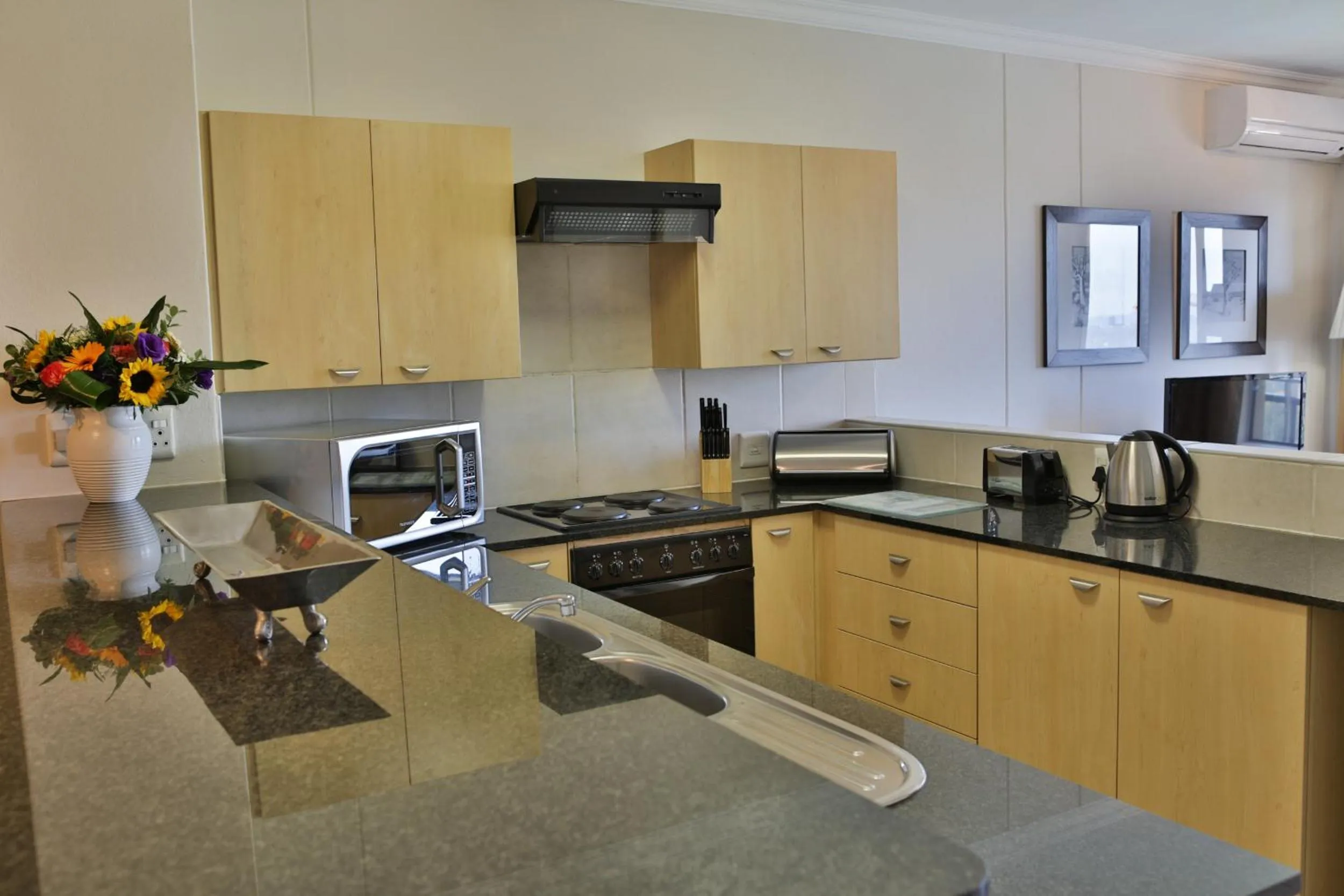 Kitchen or kitchenette in WeStay Westpoint Apartments