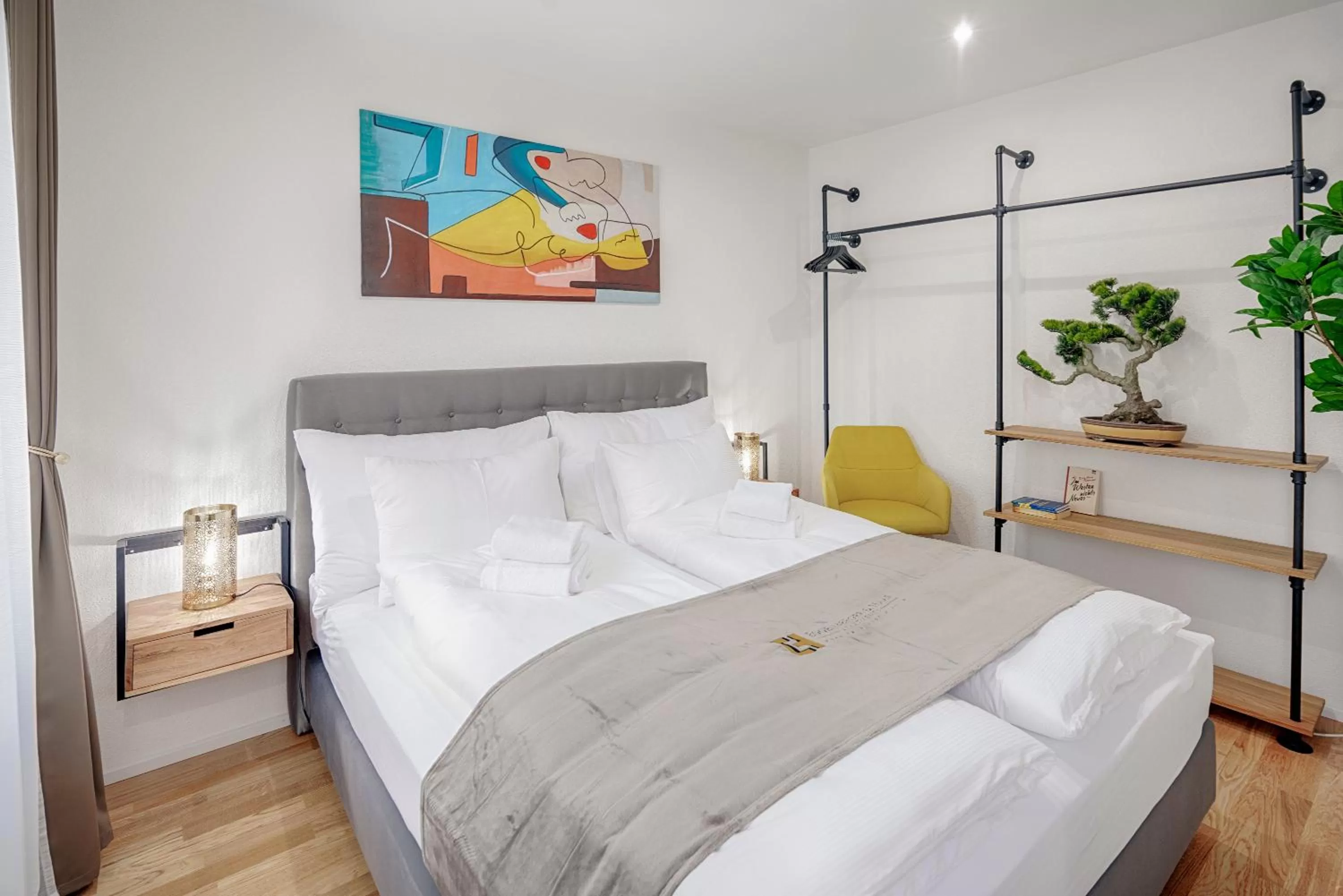 Bed in VISIMO Apartments St Georgen-Strasse St Gallen - Design City Nature