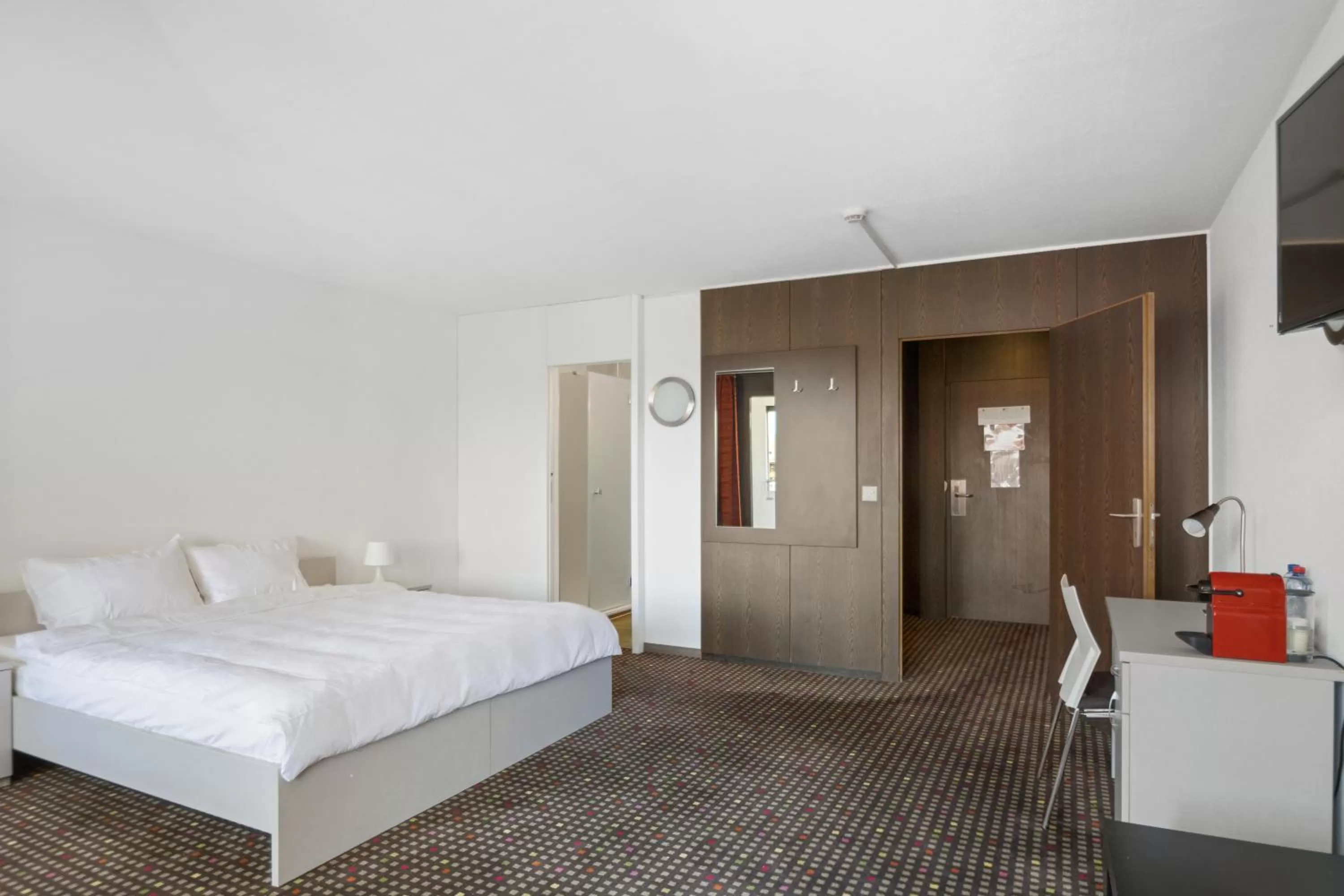 Bed in Neuchâtel City Hôtel