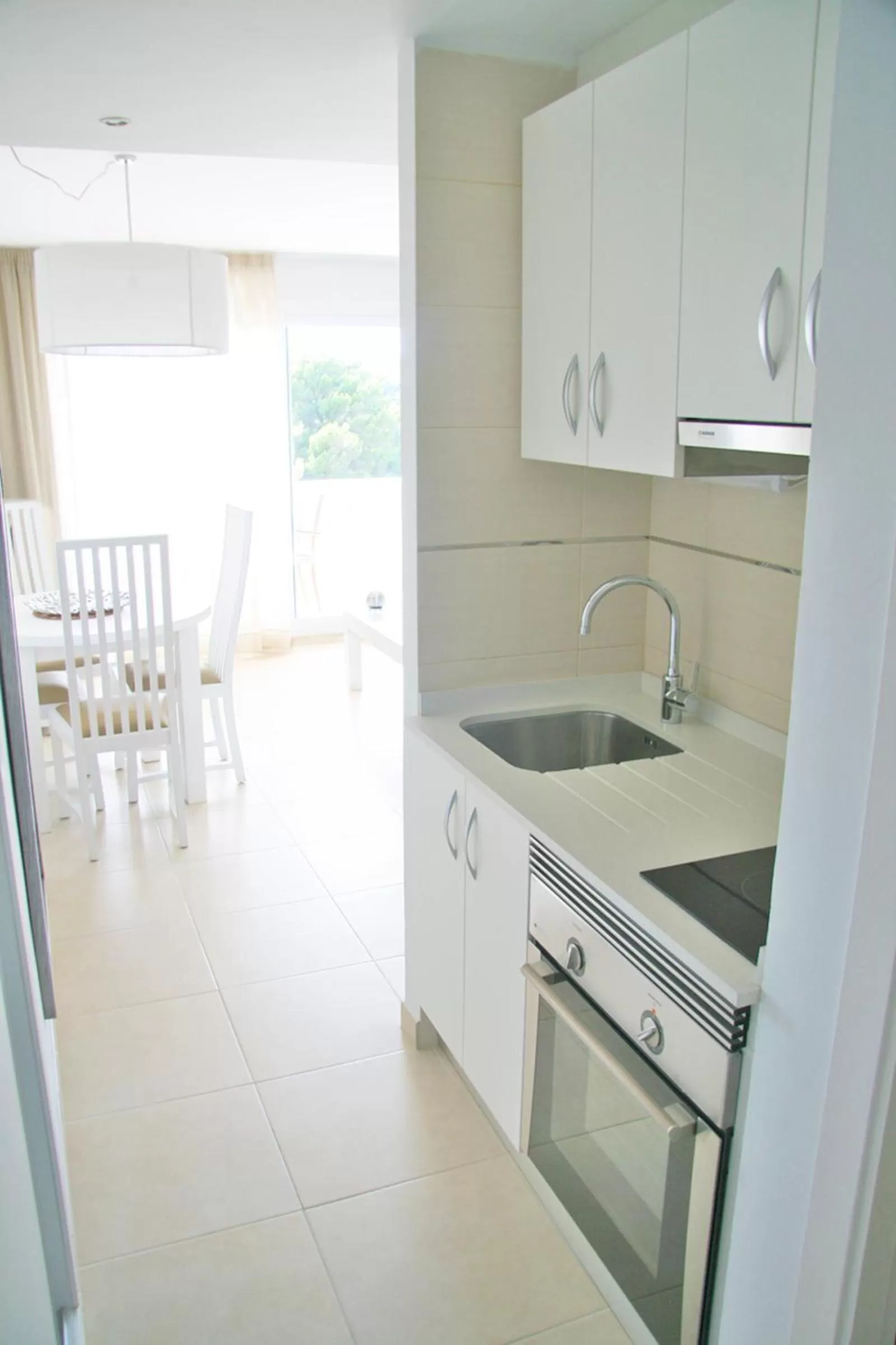 Kitchen or kitchenette in Camelina Suites