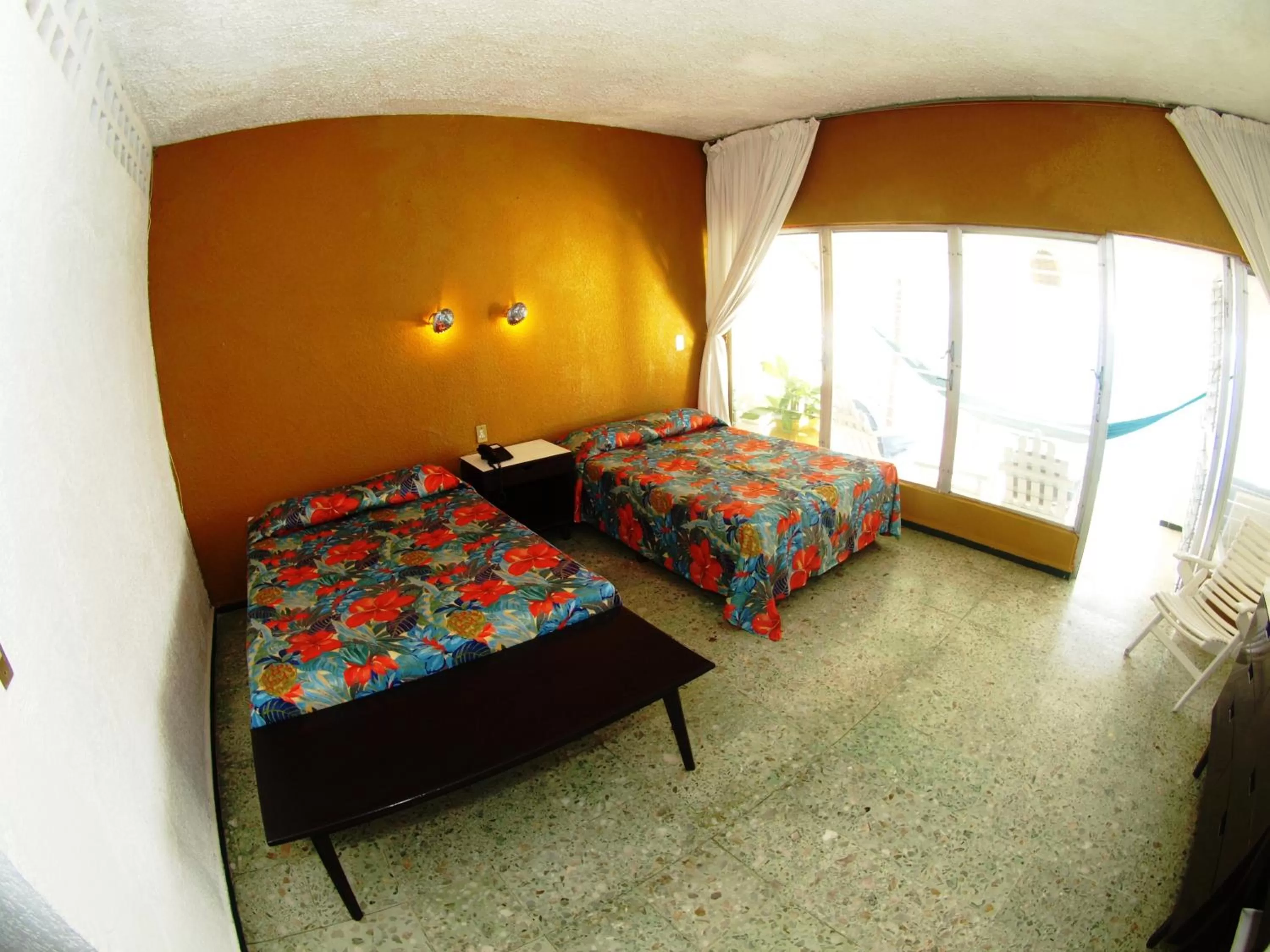 Bed in Hotel Flamingos